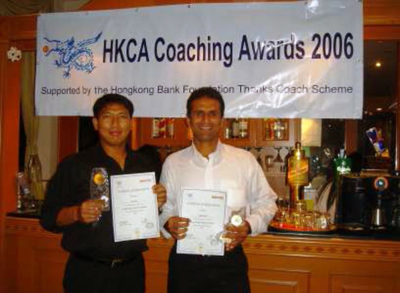 Sher Lama and Najeeb Aamer show off their prizes at the 2006 HKCA Coaching Awards