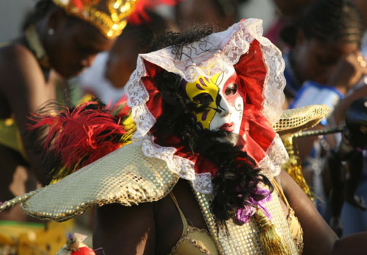 A participant dances during a carnival in Saint George's, organised by the tourism and cultural ministry to showcase the island's heritage, April 18, 2006 