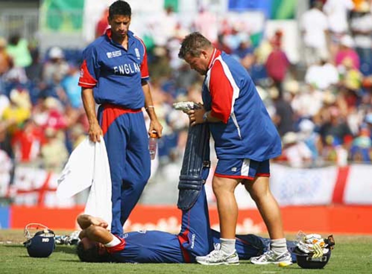 Michael Vaughan receives treatment from Dean Conway, England v West Indies, Super Eights, Barbados, April 21, 2007