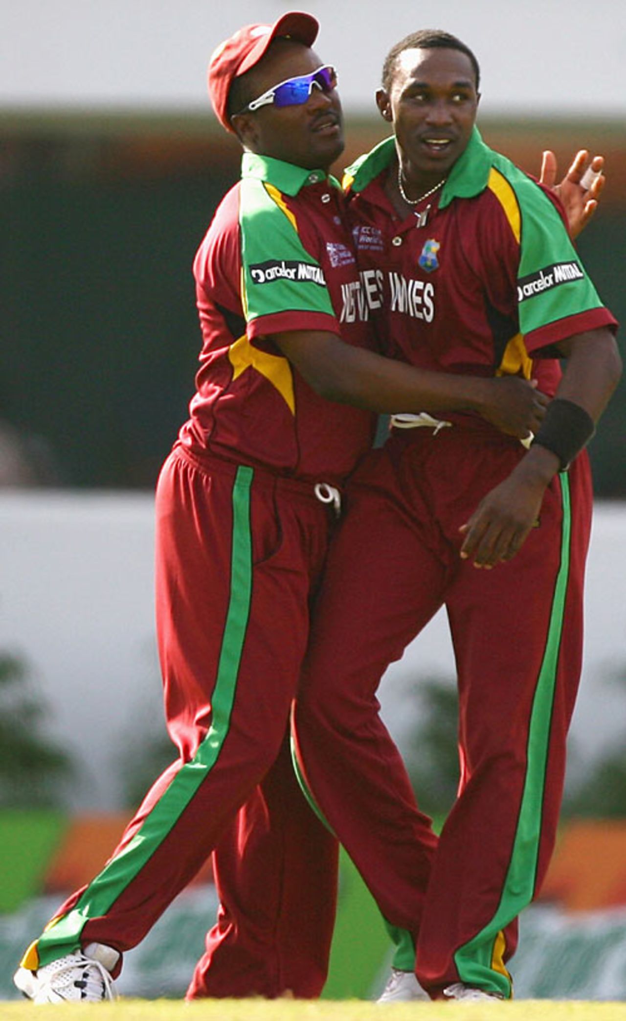 Dwayne Bravo is congratulated by Brian Lara on his second run-out, England v West Indies, Super Eights, Barbados, April 21, 2007