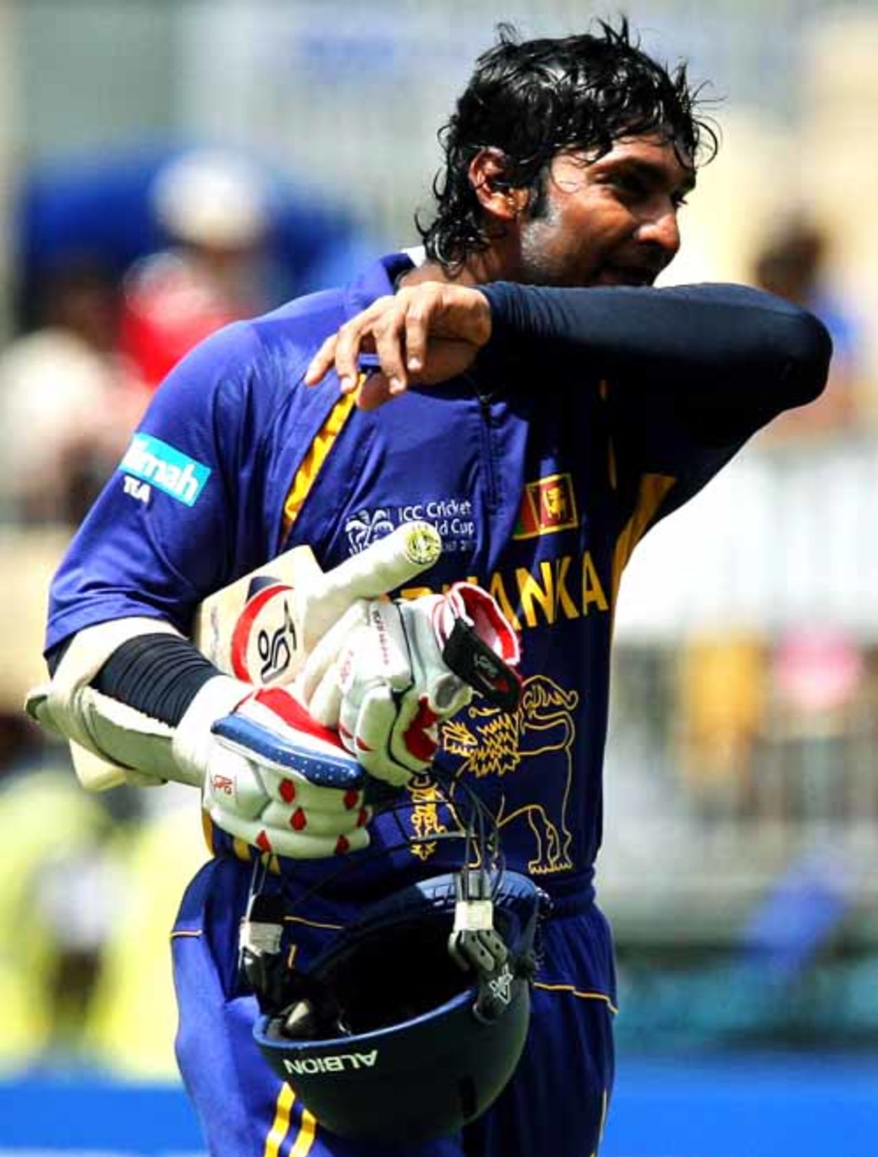 A disappointed Kumar Sangakkara walks back after being dismissed for 18, New Zealand v Sri Lanka, 1st semi-final, Jamaica, April 24, 