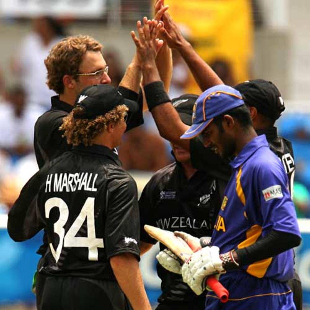 Daniel Vettori is congratulated by team-mates for dismissing Upul Tharanga, New Zealand v Sri Lanka, 1st semi-final, Jamaica, April 24, 2007
