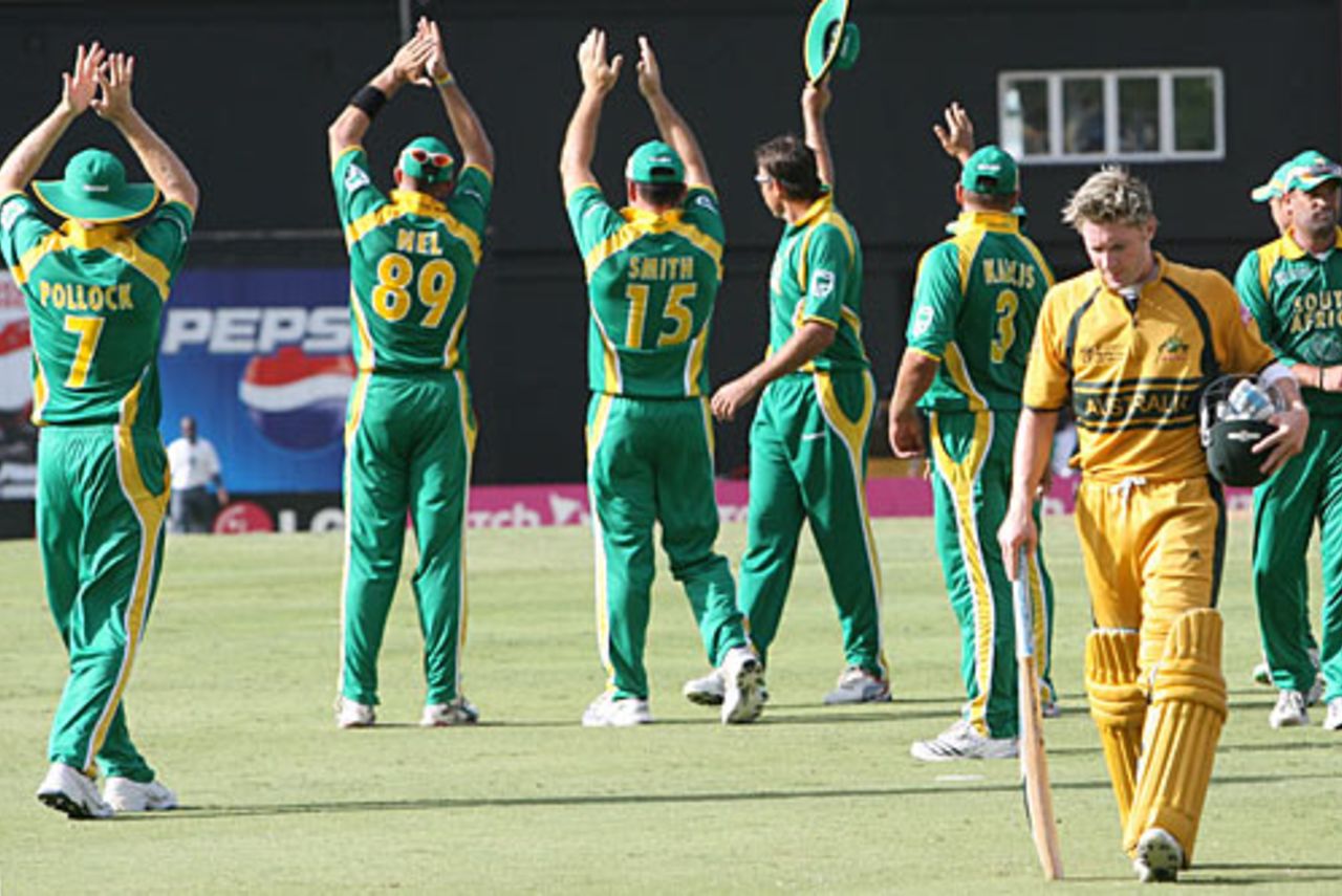 Michael Clarke heads off after his unbeaten 60 took Australia home, and South Africa salute the crowd, Australia v South Africa, 2nd semi-final, St Lucia, April 25, 2007
