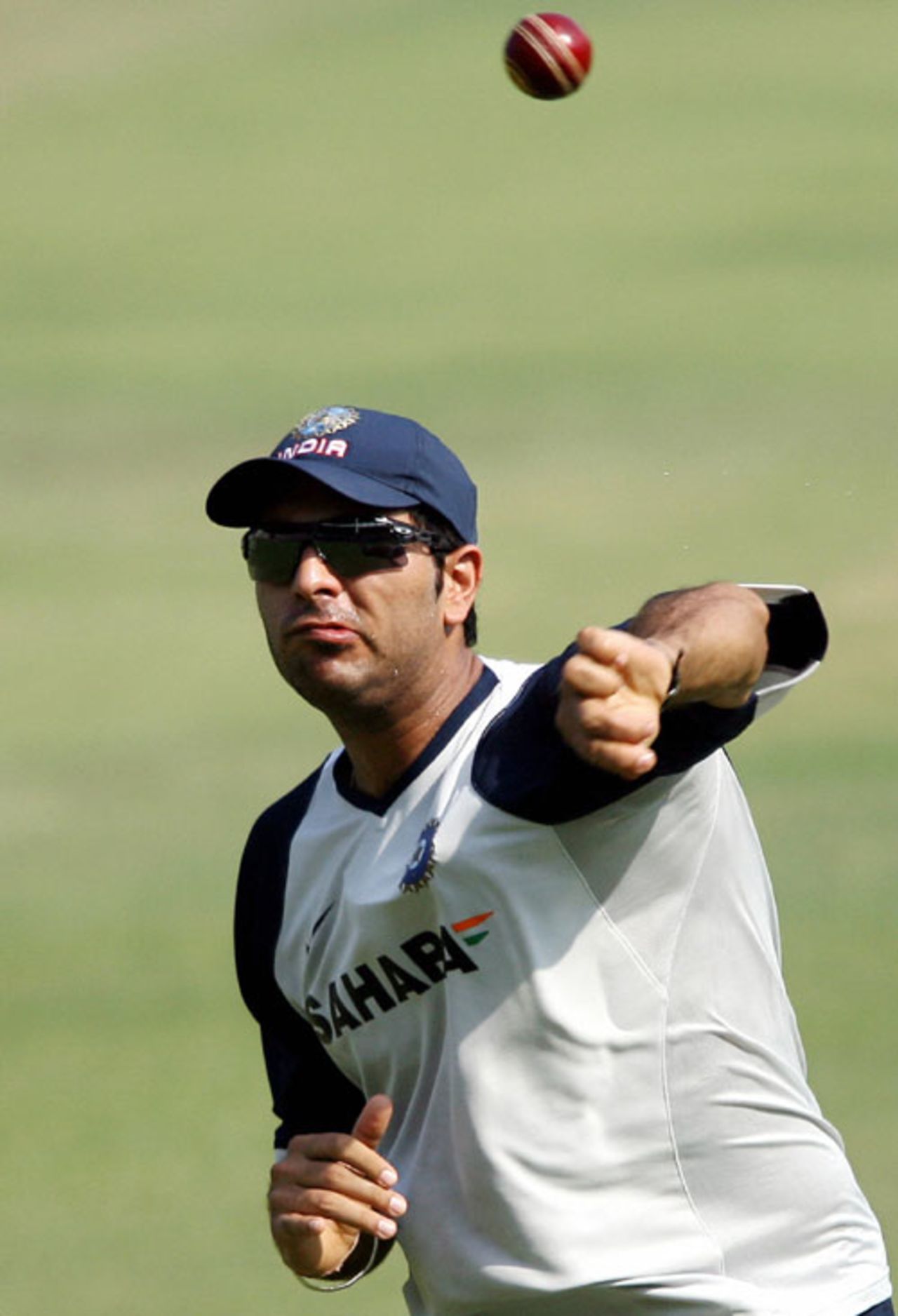 Yuvraj Singh unleashes a throw during a practice session,  Kolkata, May 3, 2007