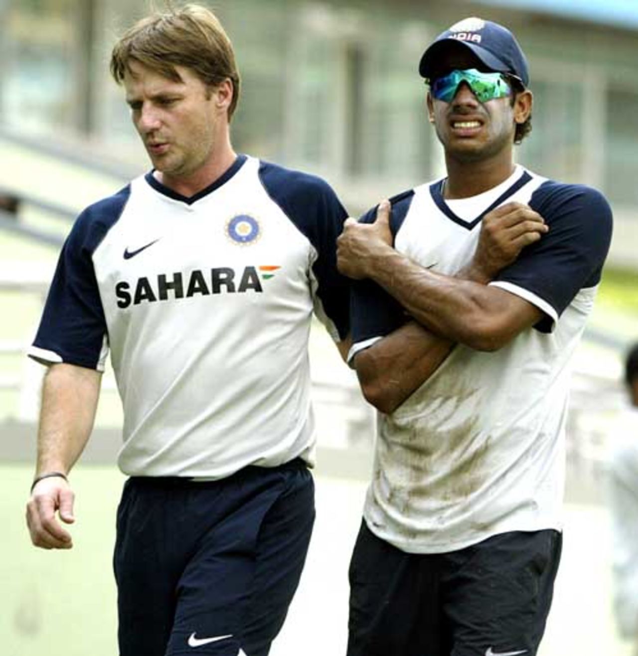 John Gloster escorts Manoj Tiwary off the field, Mirpur Stadium, Dhaka, May 8, 2007