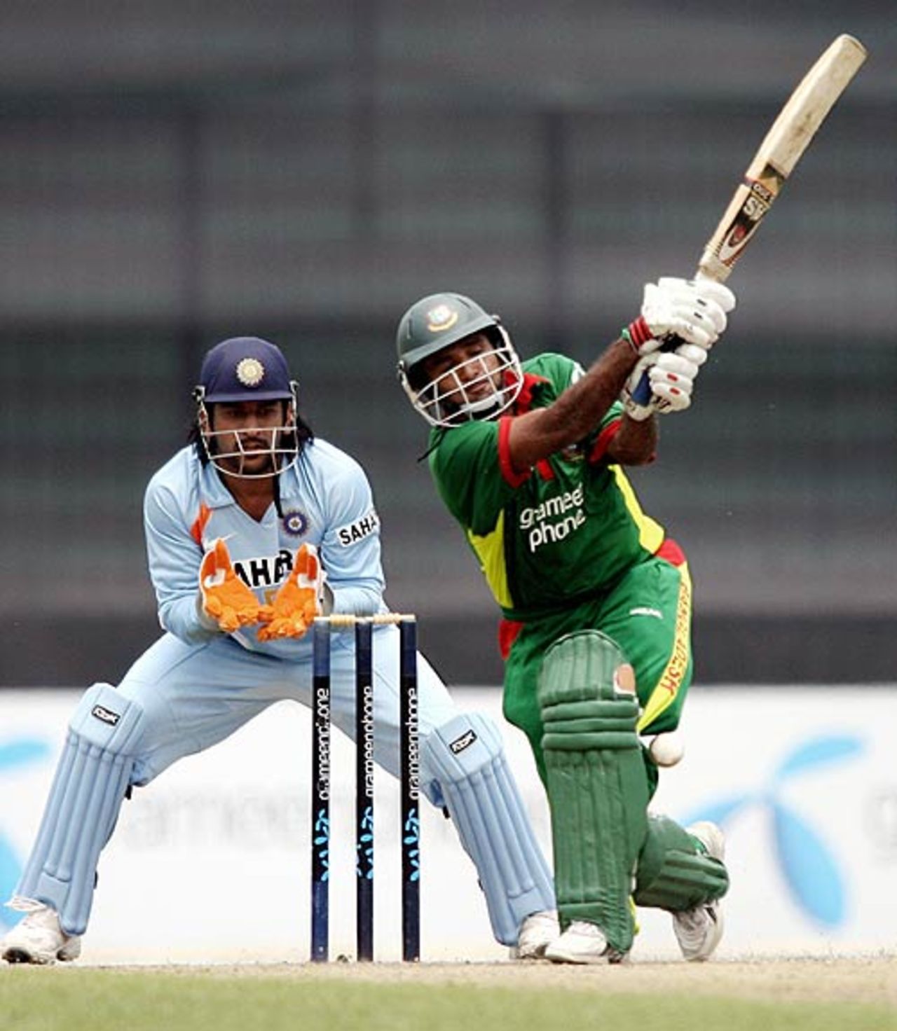 Javed Omar hits Ramesh Powar over the long-on fence, Bangladesh v India, 1st ODI, Mirpur, May 10, 2007