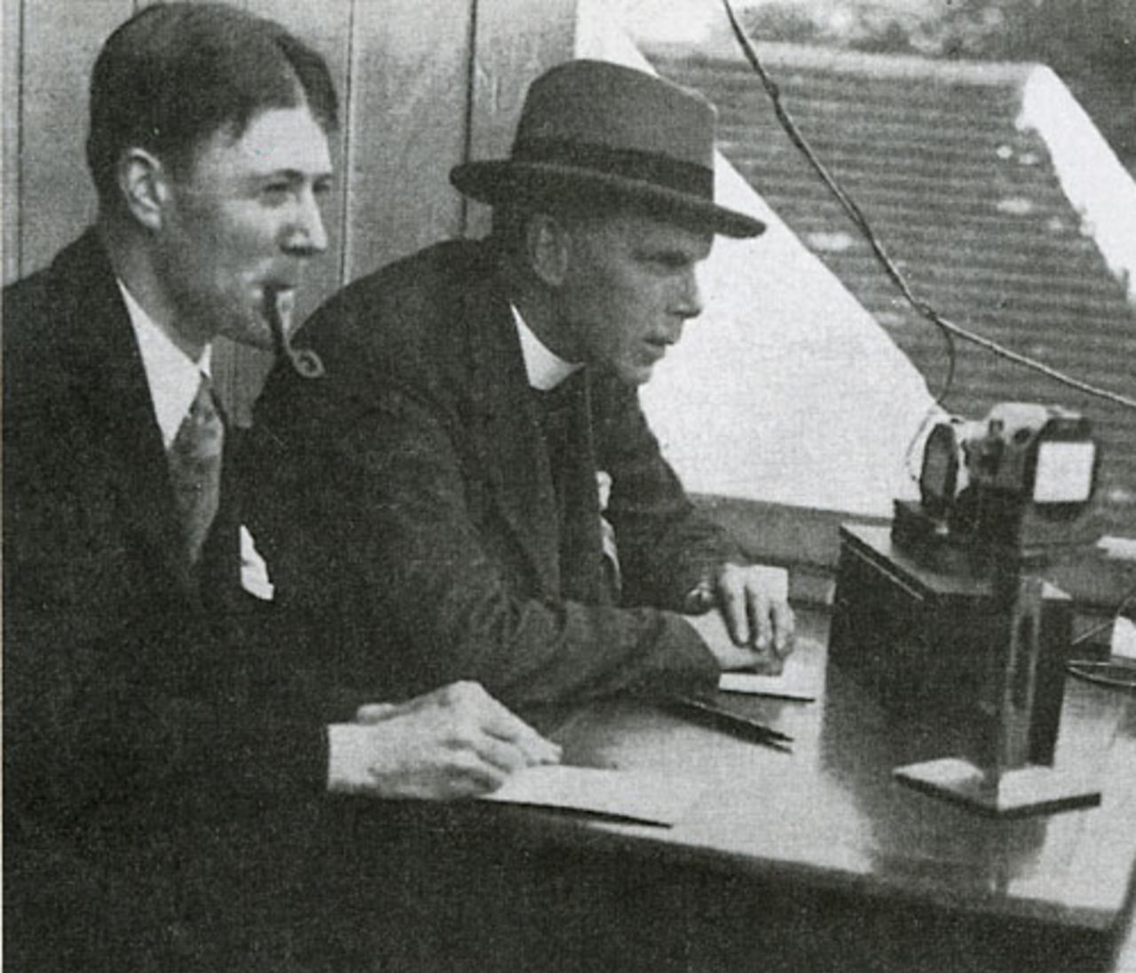 Frank Gillingham (right) broadcasting for the BBC in 1927. Gillingham gave the BBC's first live commentary on cricket during the Essex v New Zealanders match at Leyton in May 1927