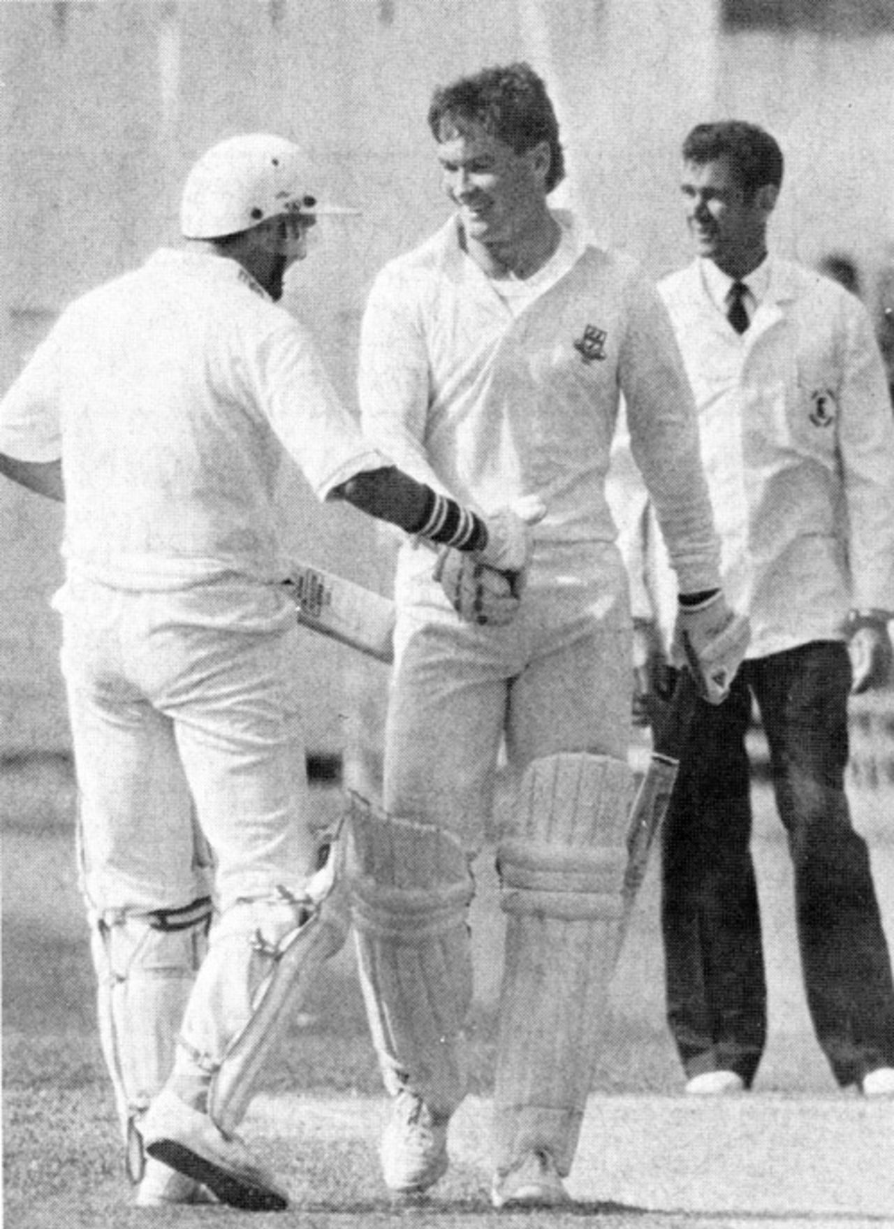 Graeme Hick is congratulated on reaching 400 by Richard Illingworth, Somerset v Worcestershire, May 6, 1988