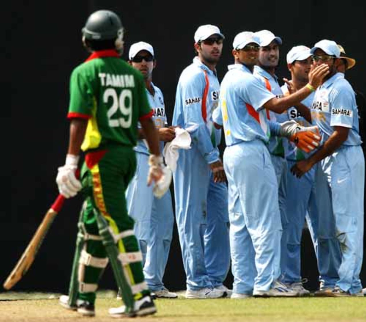 A disappointed Tamim Iqbal walks back after a horrible mixup with Javed Omar, Bangladesh v India, 2nd ODI, Mirpur, May 12, 2007