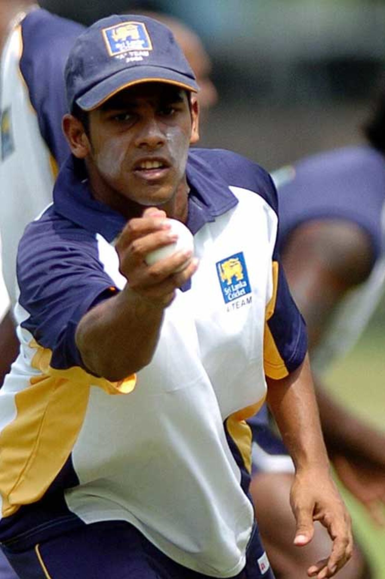 Malinda Warnapura catches a ball during a practice session, at the Nondescript Cricket Club in Colombo, May 14, 2007