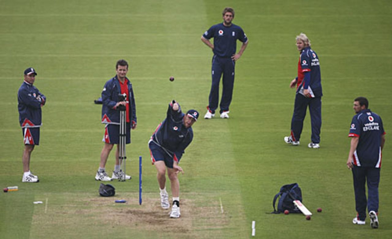 Andrew Flintoff's team-mates watch him bowl in a practice session, Lord's, May 16, 2007