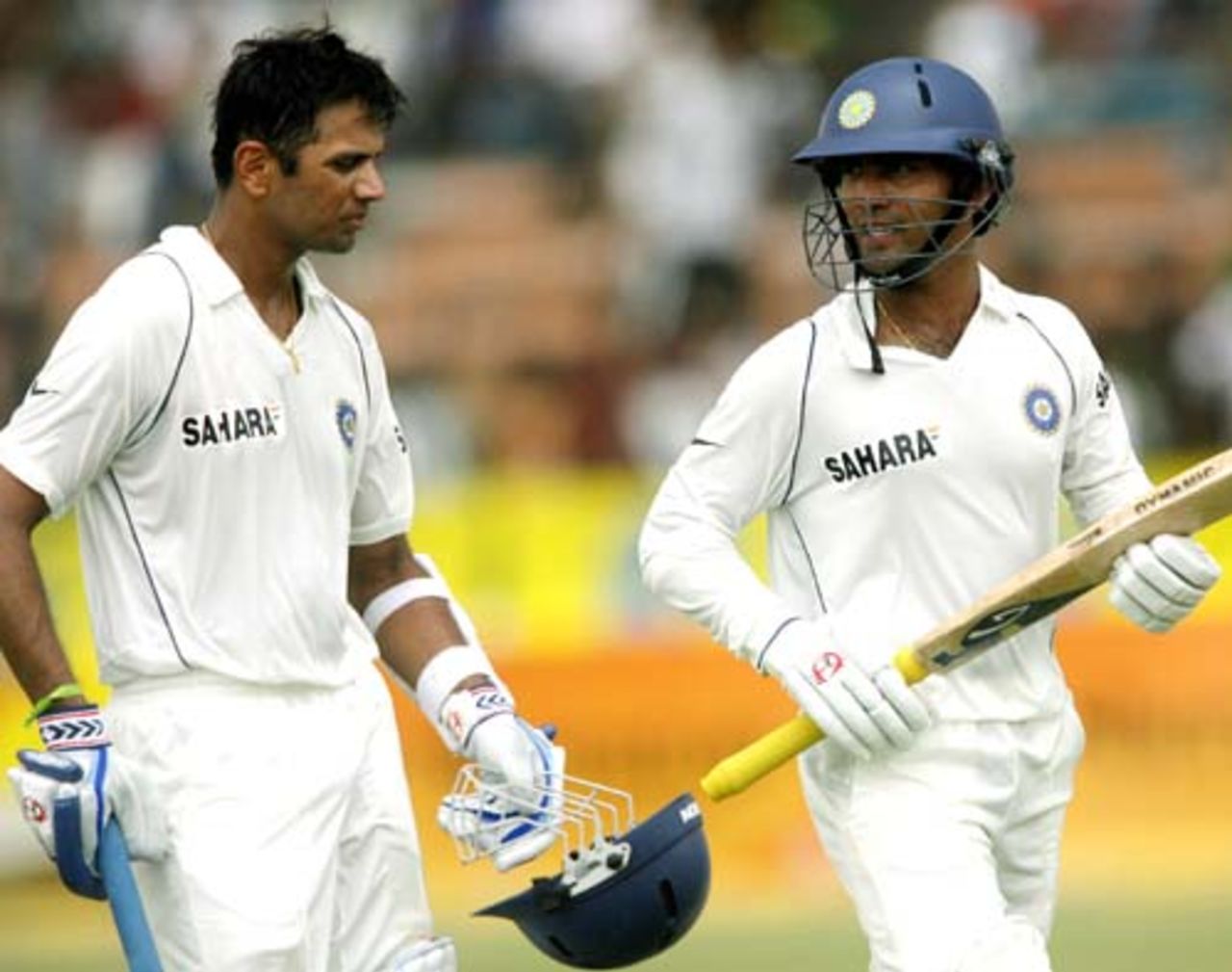 Rahul Dravid and Dinesh Karthik return to the pavillion for lunch after an unbroken stand of 113, Bangladesh v India, 1st Test, Chittagong, 1st Day