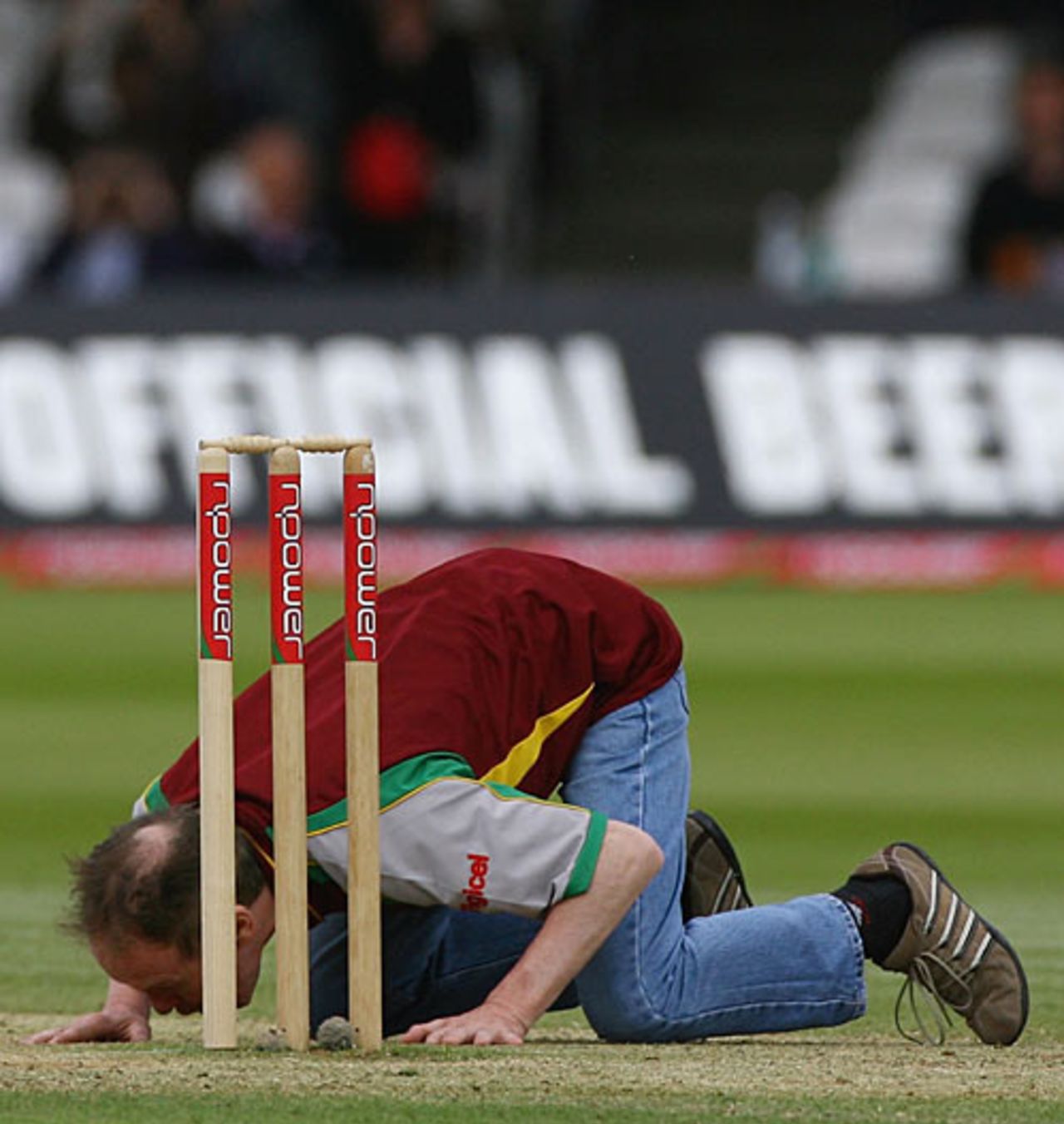 What do you think you're doing? A fan runs onto the pitch to kiss the turf, England v West Indies, 1st Test, Lord's, May 20, 2007