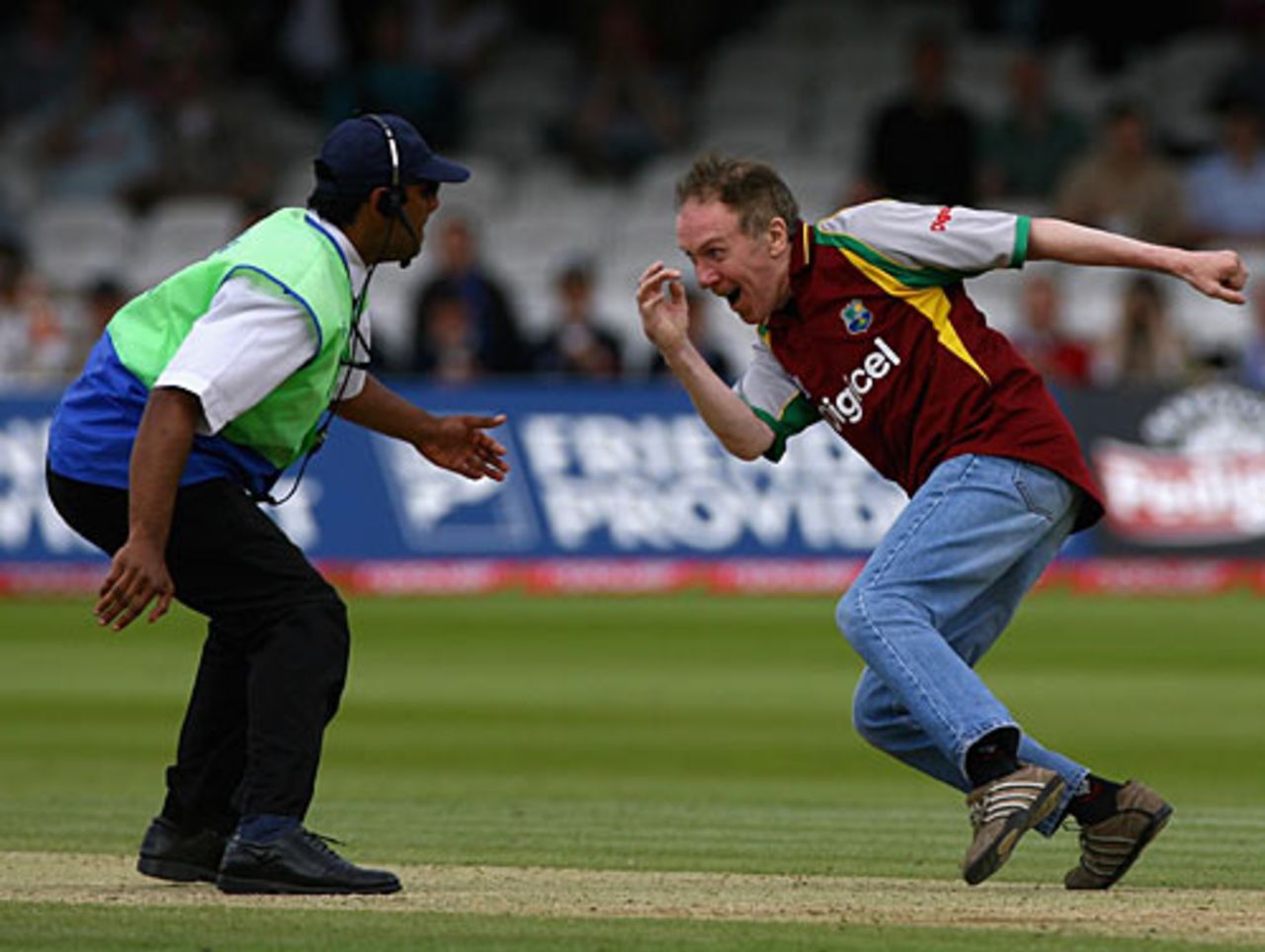 A fan gives a member of Lord's groundstaff the run-around, England v West Indies, 1st Test, Lord's, May 20, 2007