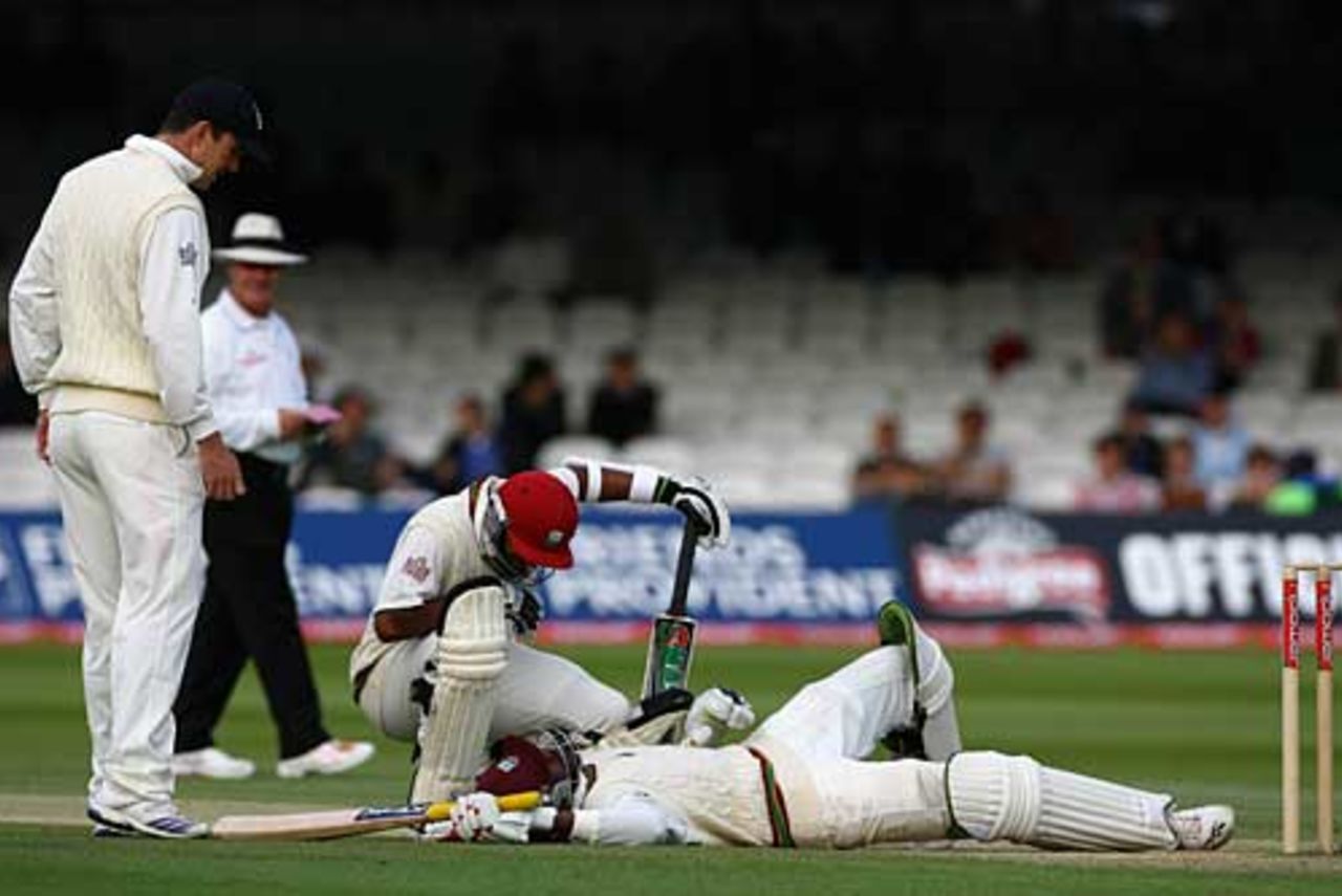 Chris Gayle lies flat-out after a painful blow from Steve Harmison, England v West Indies, 1st Test, Lord's, May 20, 2007