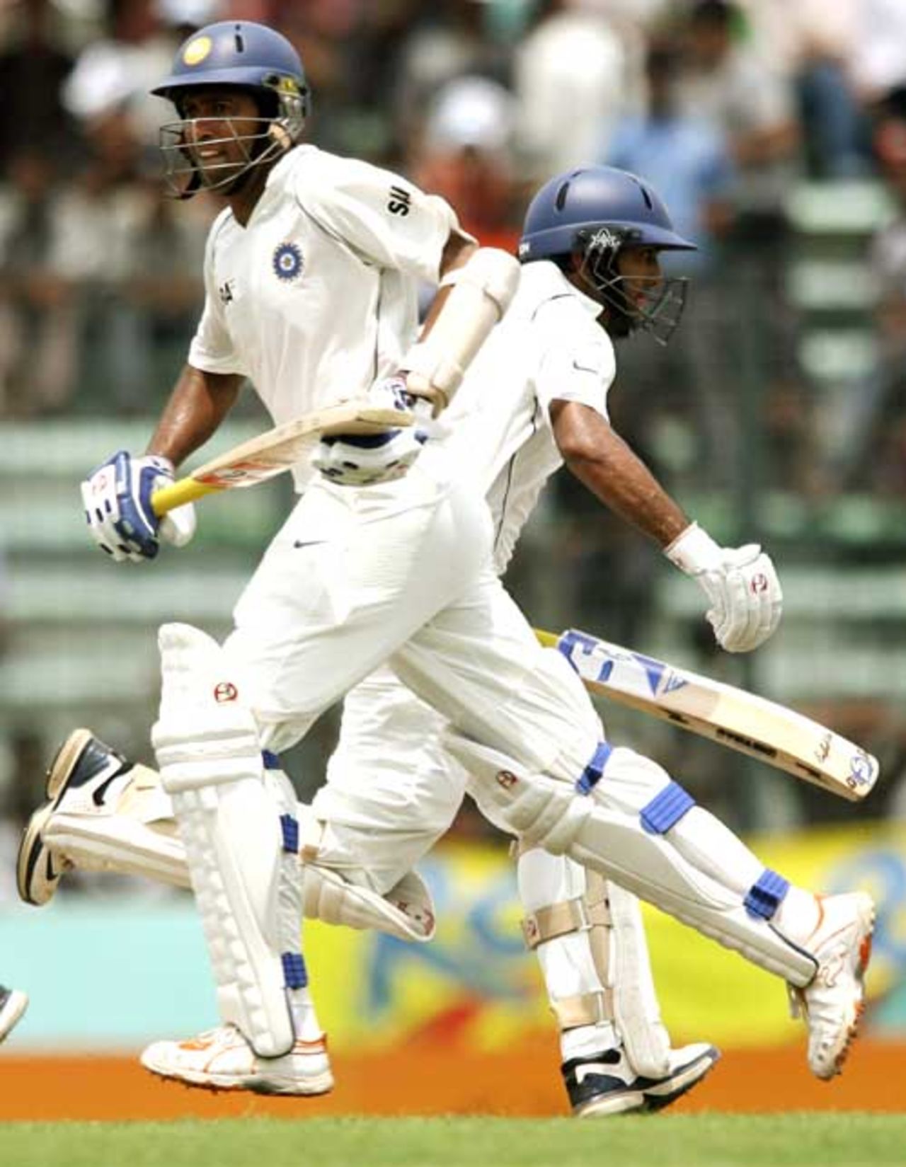 Wasim Jaffer and Dinesh Karthik take off for a single, Bangladesh v India, 2nd Test, Mirpur, 1st day, May 25, 2007