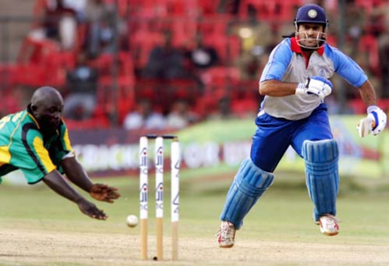 Mahendra Singh Dhoni is about to be run out by Thomas Odoyo, 1st ODI, Afro Asia Cup, Bangalore June 6, 2007