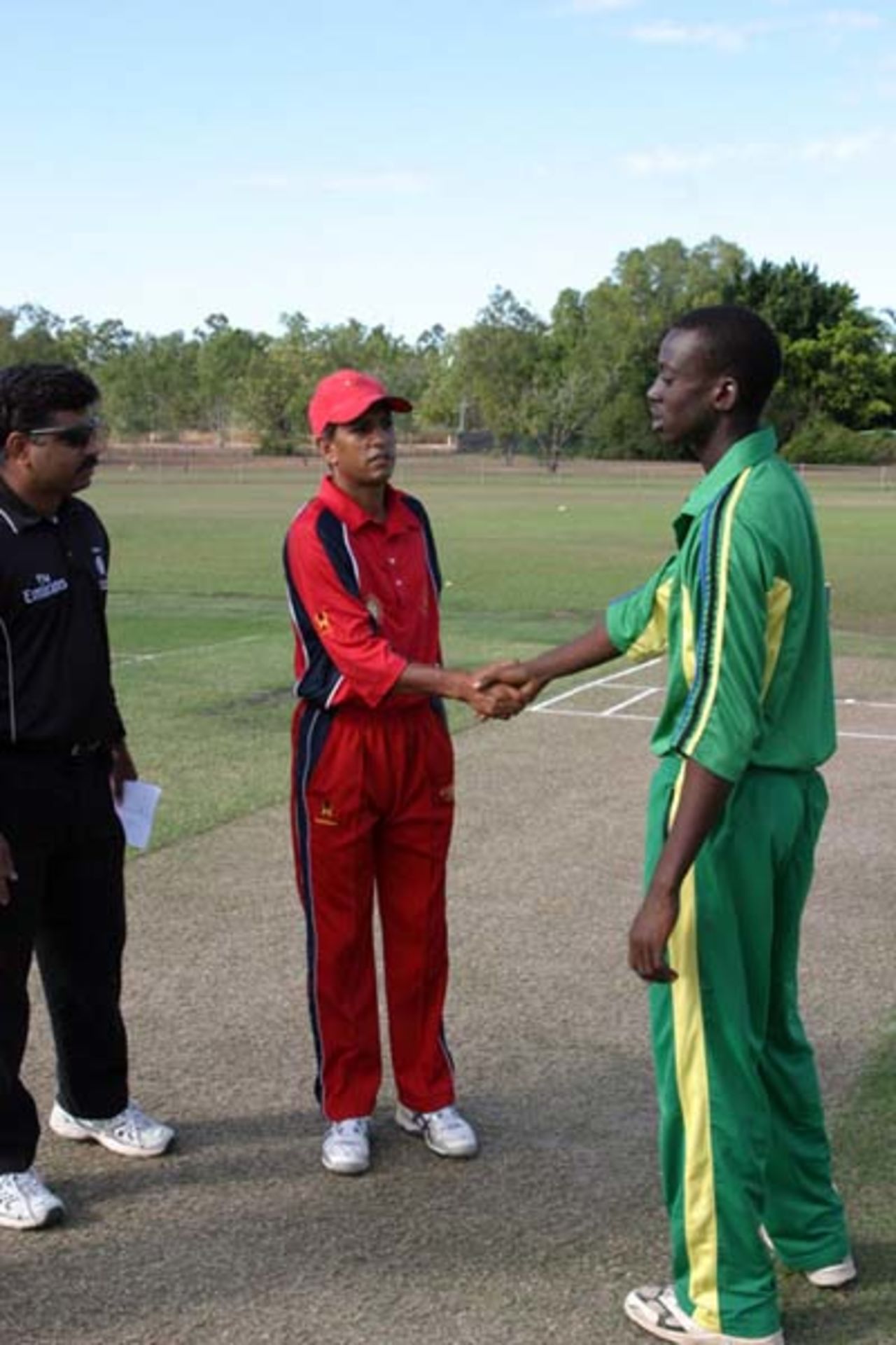 Hamisi Abdallah shakes hands with Ilyas Gul of Hong Kong at the toss, May 2007
