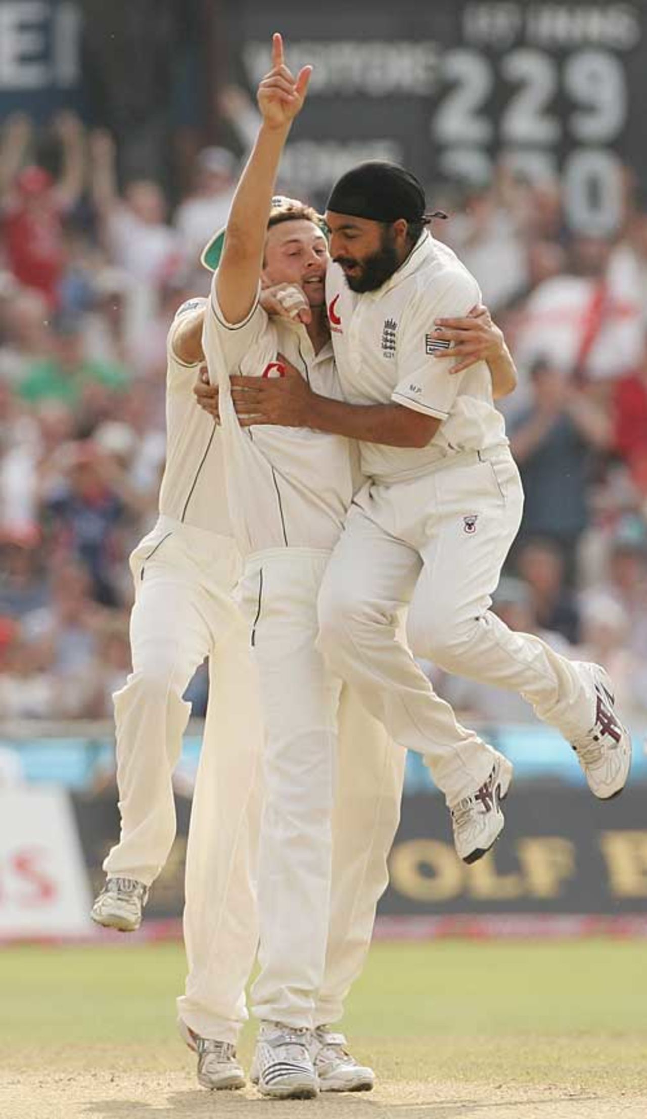 Steve Harmison gets a leaping Monty Panesar after removing Daren Ganga, England v West Indies, 3rd Test, Old Trafford, June 9, 2007
