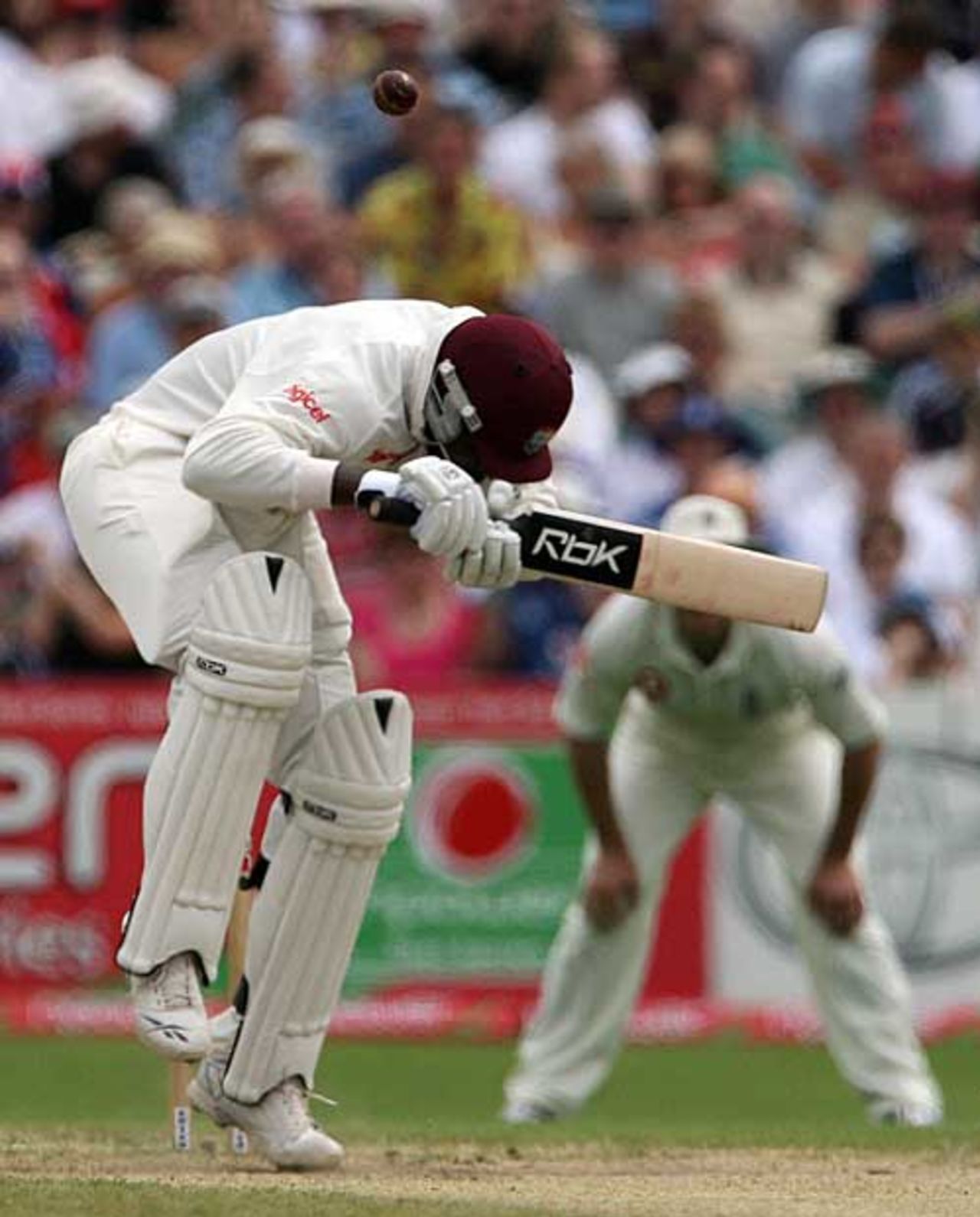 Chris Gayle ducks under an early bouncer from Steve Harmison, England v West Indies, 3rd Test, Old Trafford, June 10, 2007