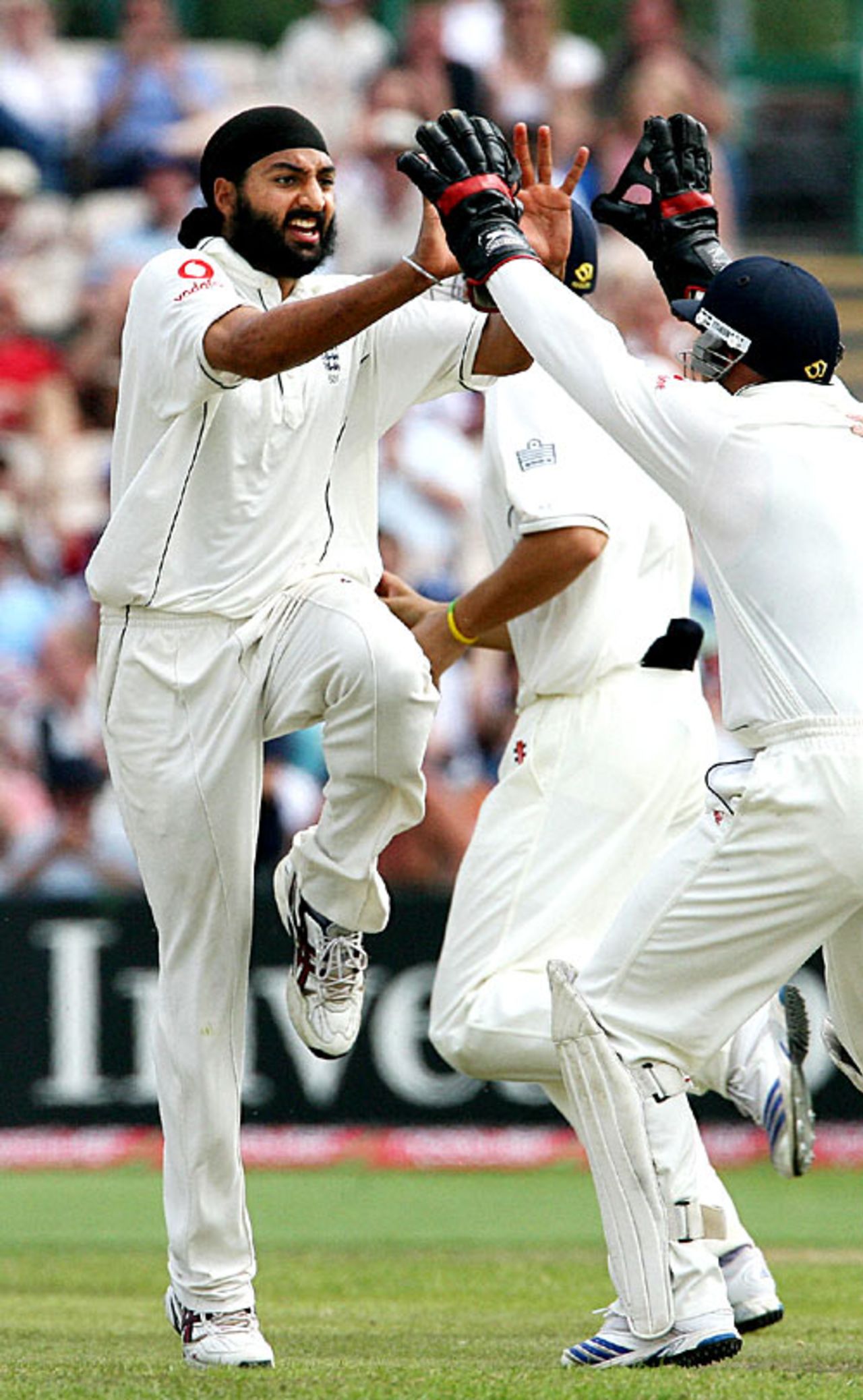 Monty Panesar hops and skips in jubilation after dismissing Devon Smith, England v West Indies, 3rd Test, Old Trafford, June 10, 2007