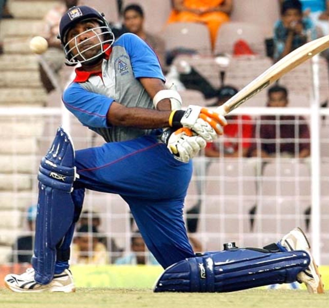 Mahela Jayawardene plays a sweep shot during the third ODI of the Afro-Asia Cup , Chennai, June 10, 2007