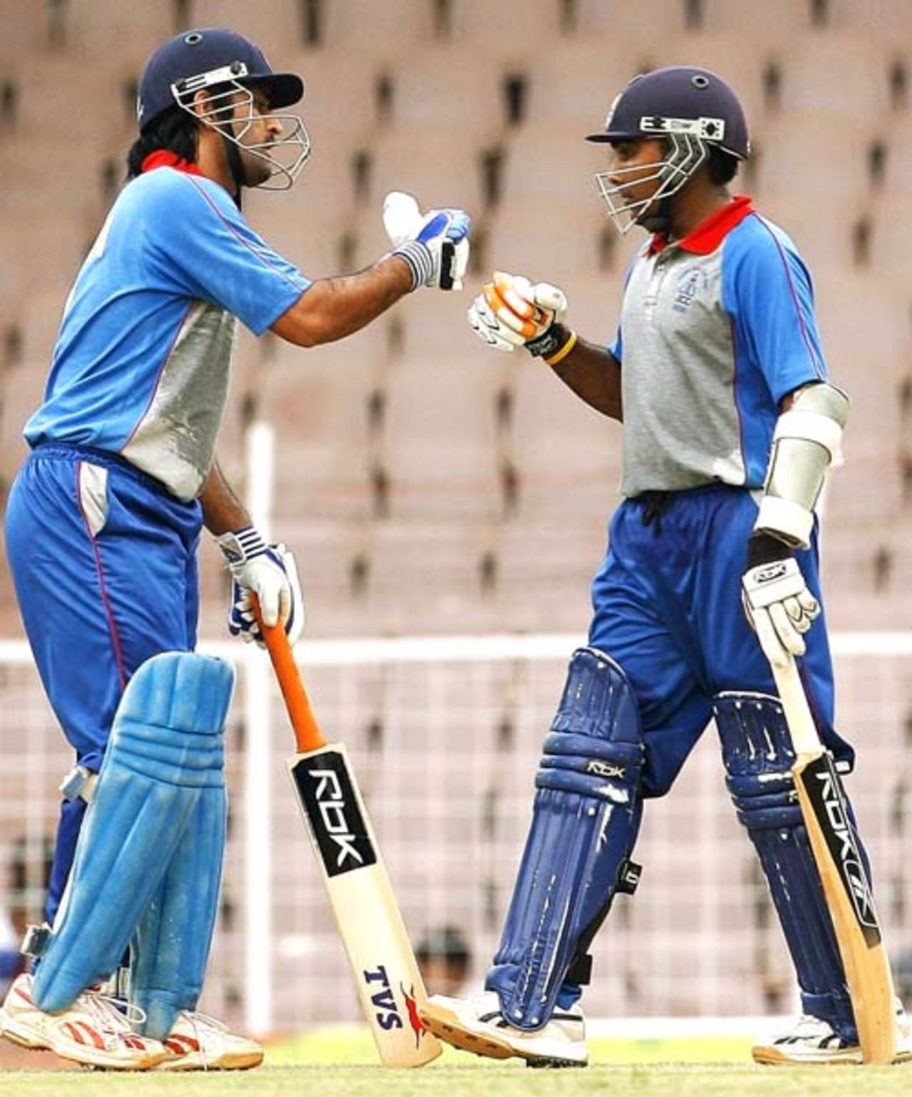 Mahendra Singh Dhoni and Mahela Jayawardane proved to be an ideal foil for each other during  their century stand at the third ODI of the Afro-Asia Cup, Chennai, June 10, 2007 
