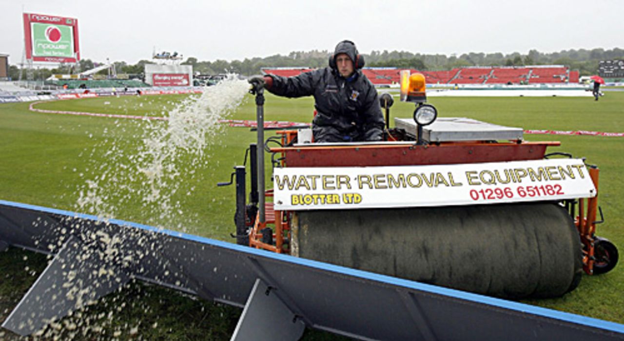 A groundsman removes water from the pitch at Chester-le-Street, England v West Indies, 4th Test, Chester-le-Street, June 15, 2007