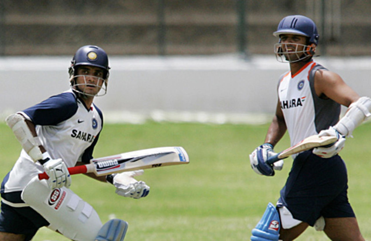 Sourav Ganguly and Rahul Dravid jog through for a single, Bangalore, June 15, 2007