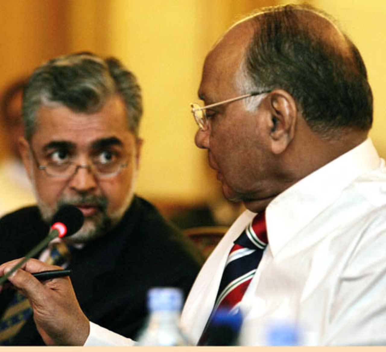 Nasim Ashraf, chairman of the Pakistan board, talks to Sharad Pawar, President of the BCCI, during a meeting of the four countries that are hosting the 2011 World Cup in Bhurban, June 18, 2007