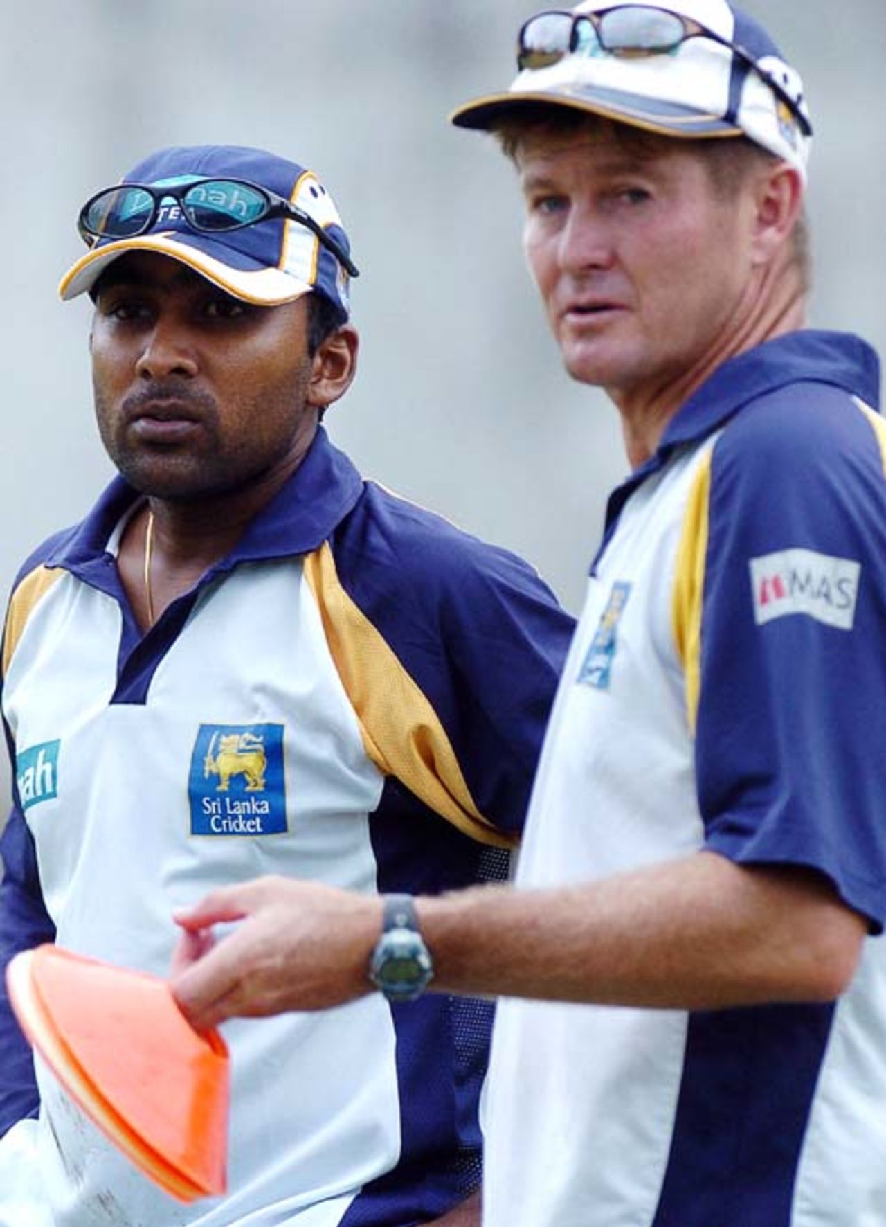 Mahela Jayawardene and Trevor Penney watch over a practise session at the Nondescript Cricket Club (NCC) in Colombo, June 18, 2007
