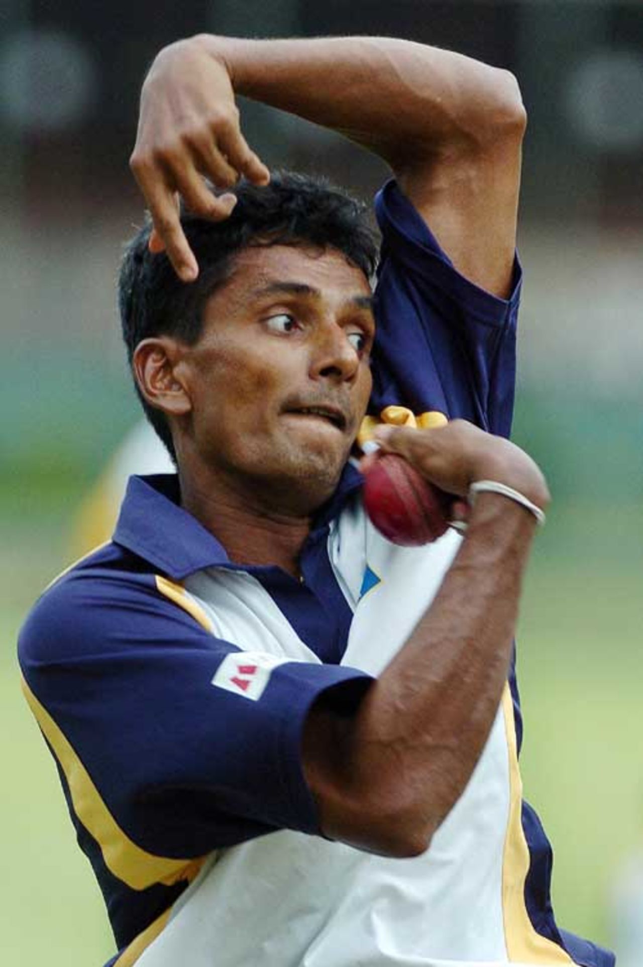 Upul Chandana has a bowl during a practice session at the Nondescript Cricket Club (NCC) in Colombo, June 18, 2007