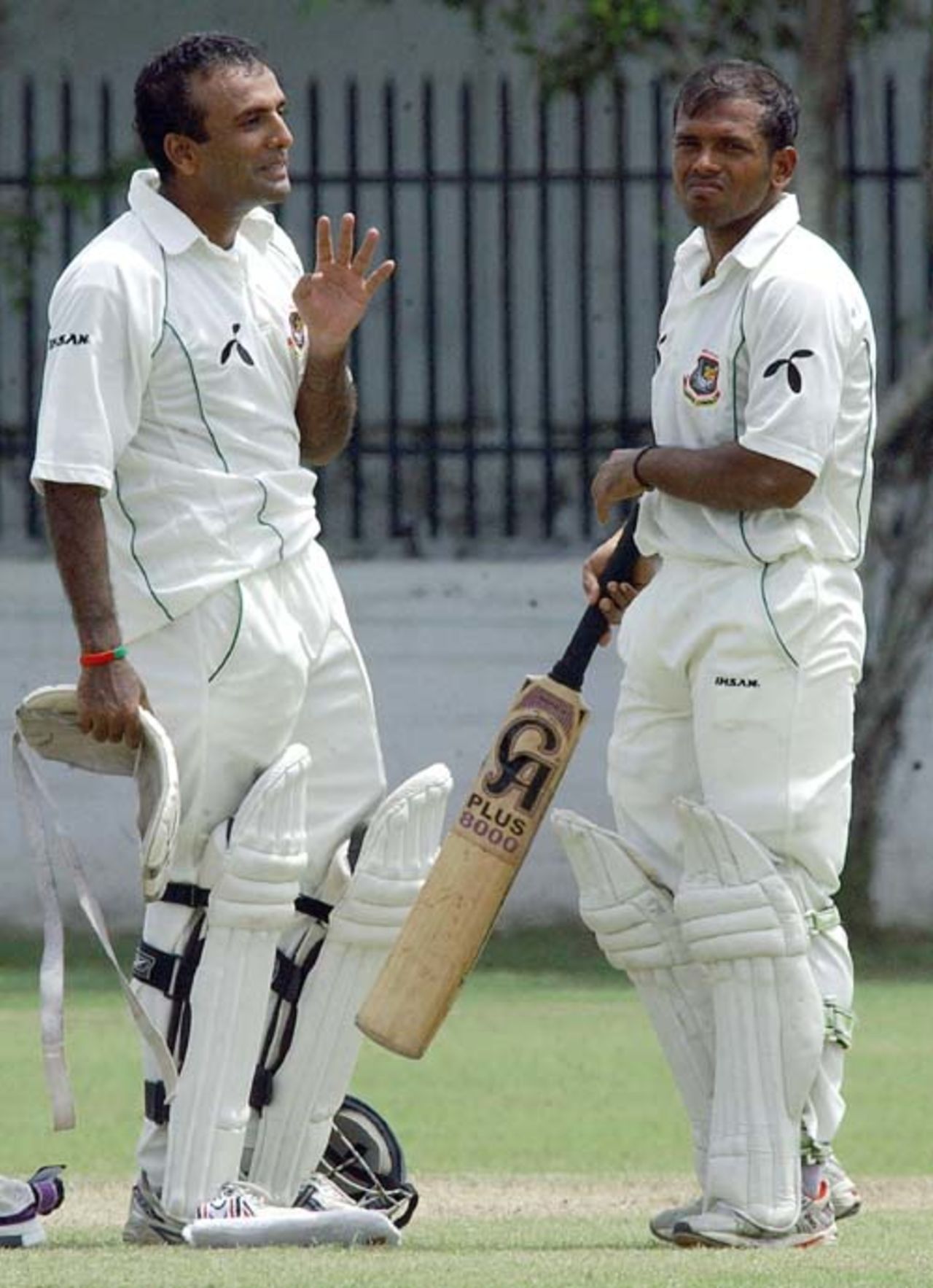 Javed Omar  and Rajin Saleh chat during a break in play  Sri Lanka A v Bangladeshis, Colombo, June 20, 2007