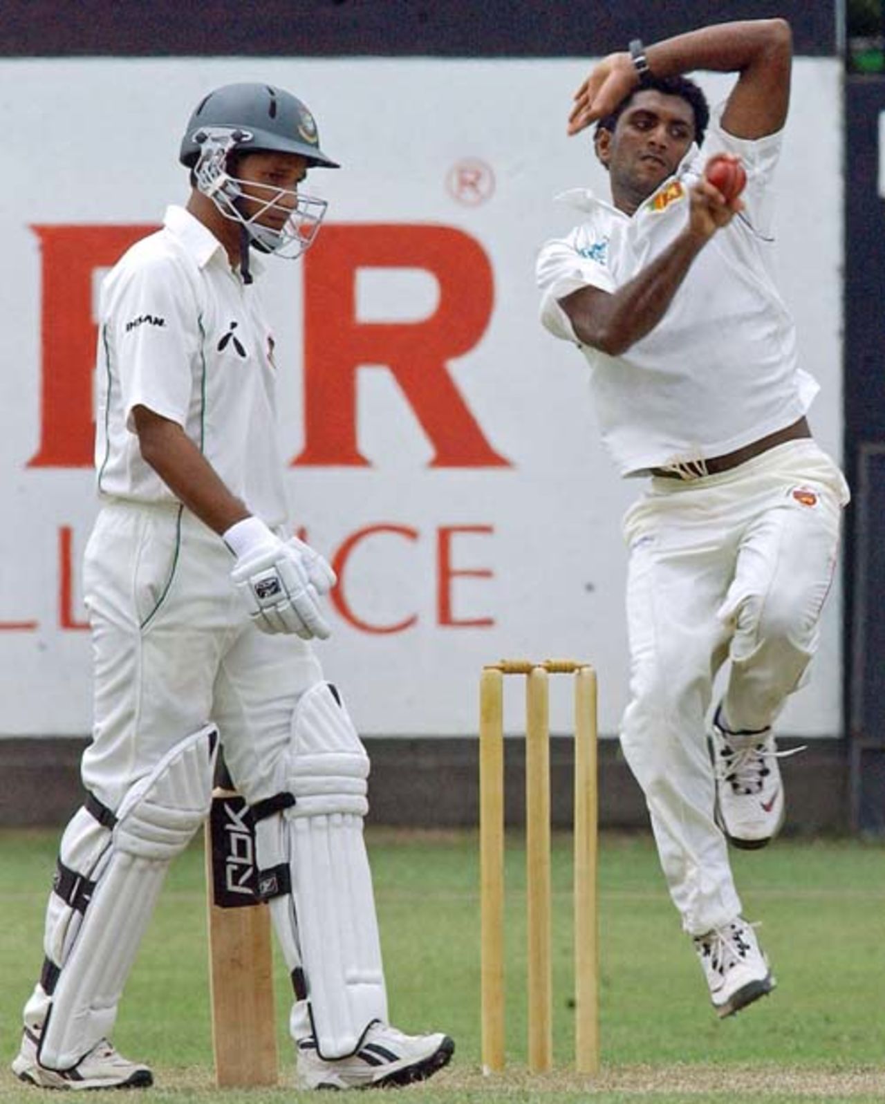 Dammika Prasad is in his delivery stride as Habibul Bashar looks on, Sri Lanka A v Bangladesh, Colombo, June 20, 2007
