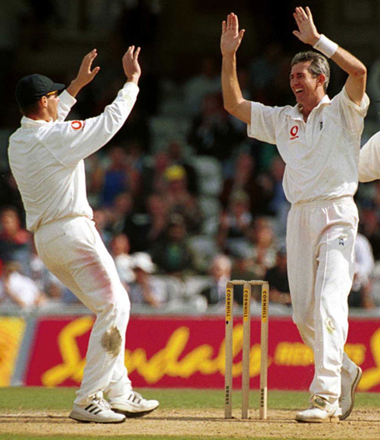 Graeme Hick congratulates Andy Caddick on a wicket, England v West Indies, 5th Test, The Oval, September 4, 2000