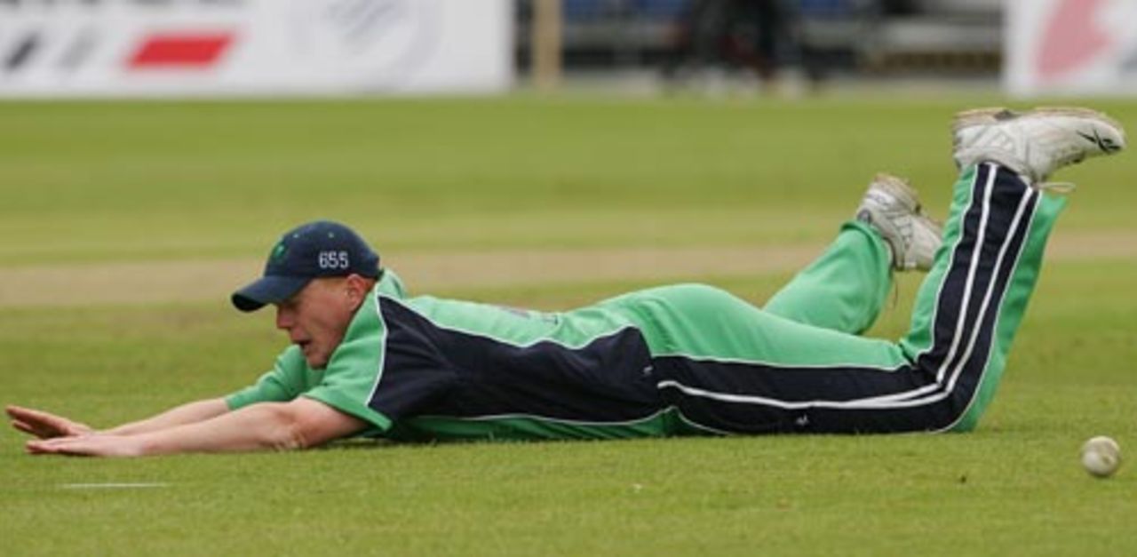 Kevin O'Brien is a bit late with the dive as the ball has already beaten him, Ireland v South Africa, Belfast, One-off ODI, June 24, 2007