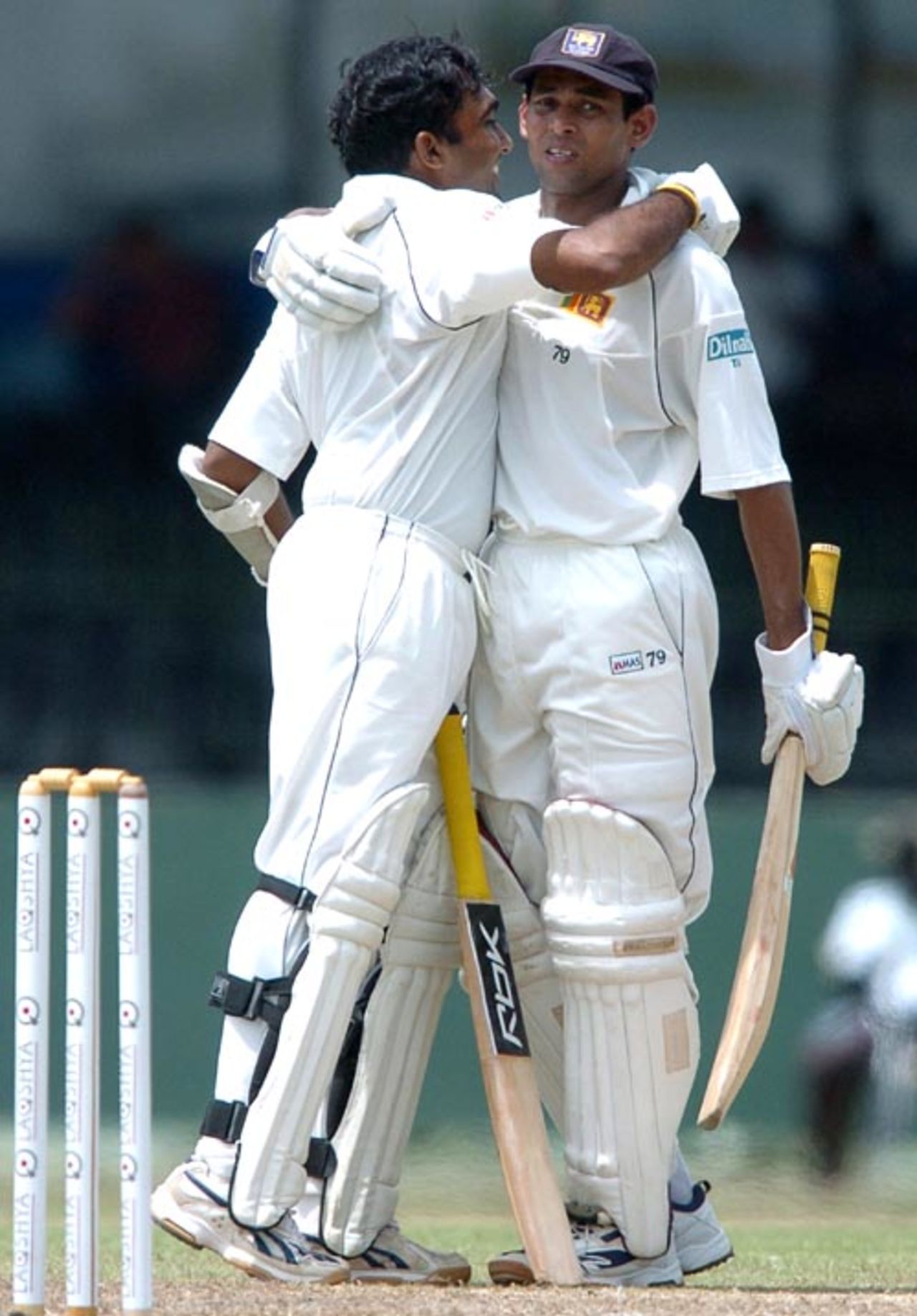 Mahela Jayawardene is congratulated by Tillekeratne Dilshan after reaching his century, Sri Lanka v Bangladesh, 1st Test, Colombo, 2nd day, June 26, 2007