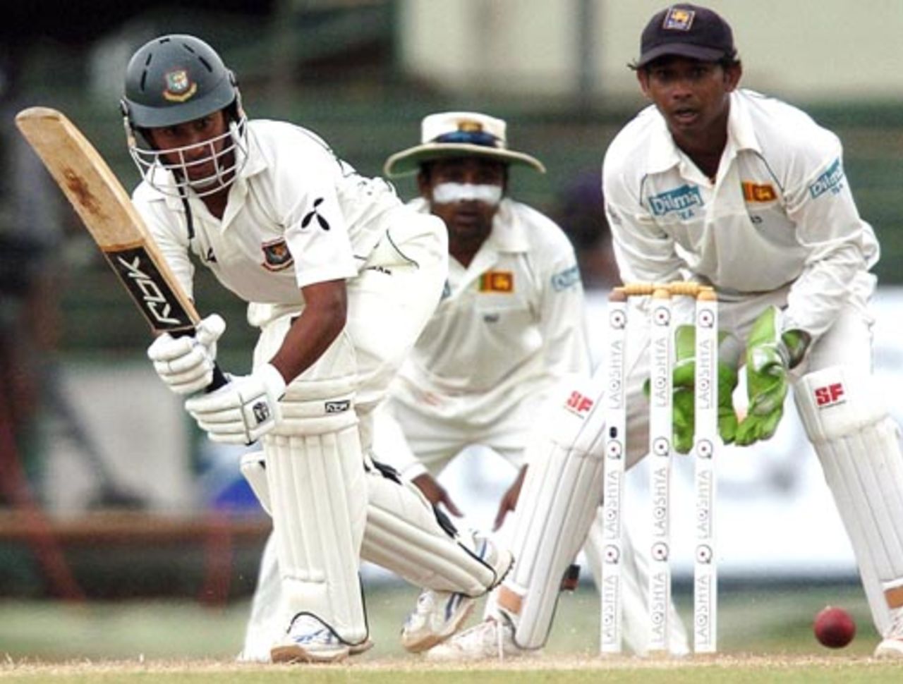 Mohammad Ashraful flicks one through the leg side as wicketkeeper Prasanna Jayawardene and captain Mahela Jayawardene look on, Sri Lanka v Bangladesh, 1st Test, Colombo (SSC), 3rd day, June 27, 2007