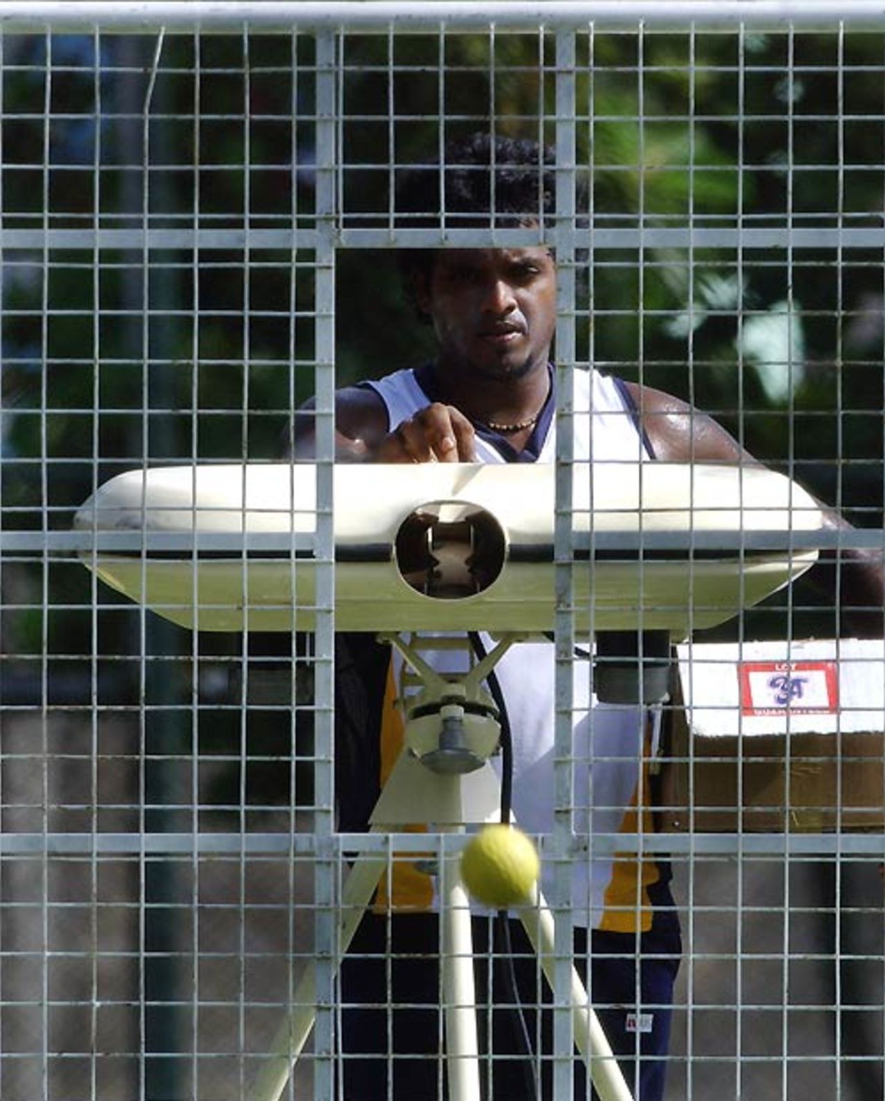 Dilhara Fernando gets behind the controls of a bowling machine, Colombo, July 1, 2007