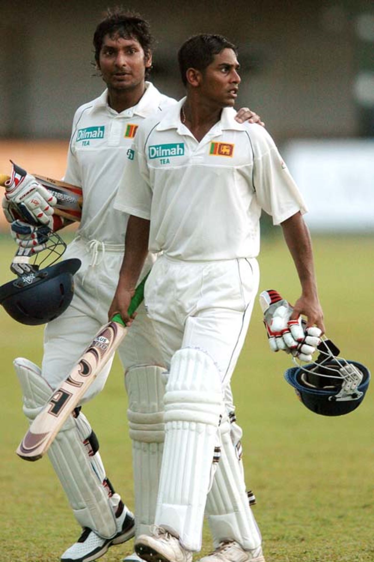 Malinda Warnapura and Kumar Sangakkara walk back to the pavillion after the batsmen were offered the light, Sri Lanka v Bangladesh, 2nd Test, P Saravanamuttu Stadium, Colombo, 1st day, July 3, 2007