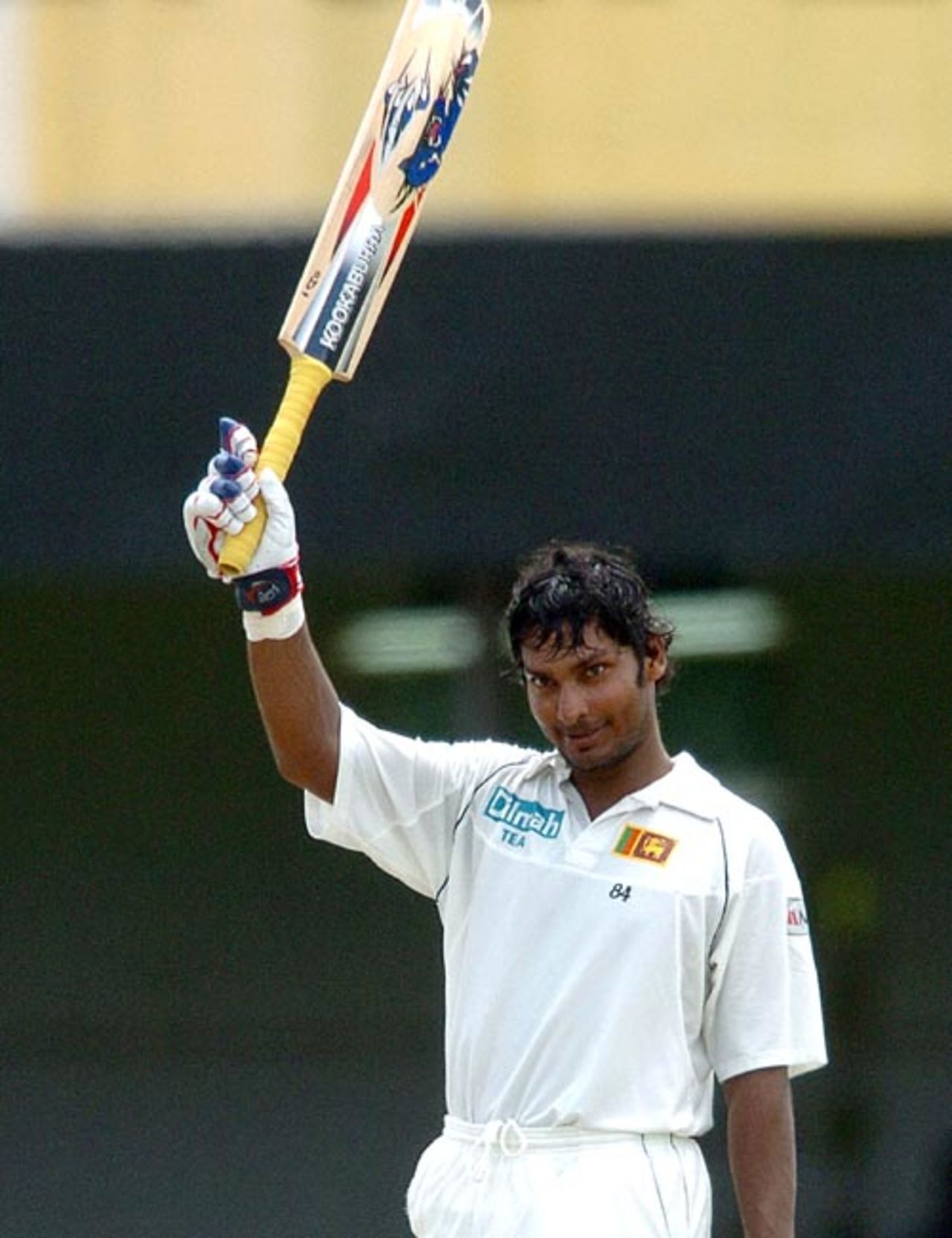 Kumar Sangakkara acknowledges the cheers after reaching his 13th Test hundred, Sri Lanka v Bangladesh, 2nd Test, P Saravanamuttu Stadium, Colombo, 2nd day, July 4, 2007 
