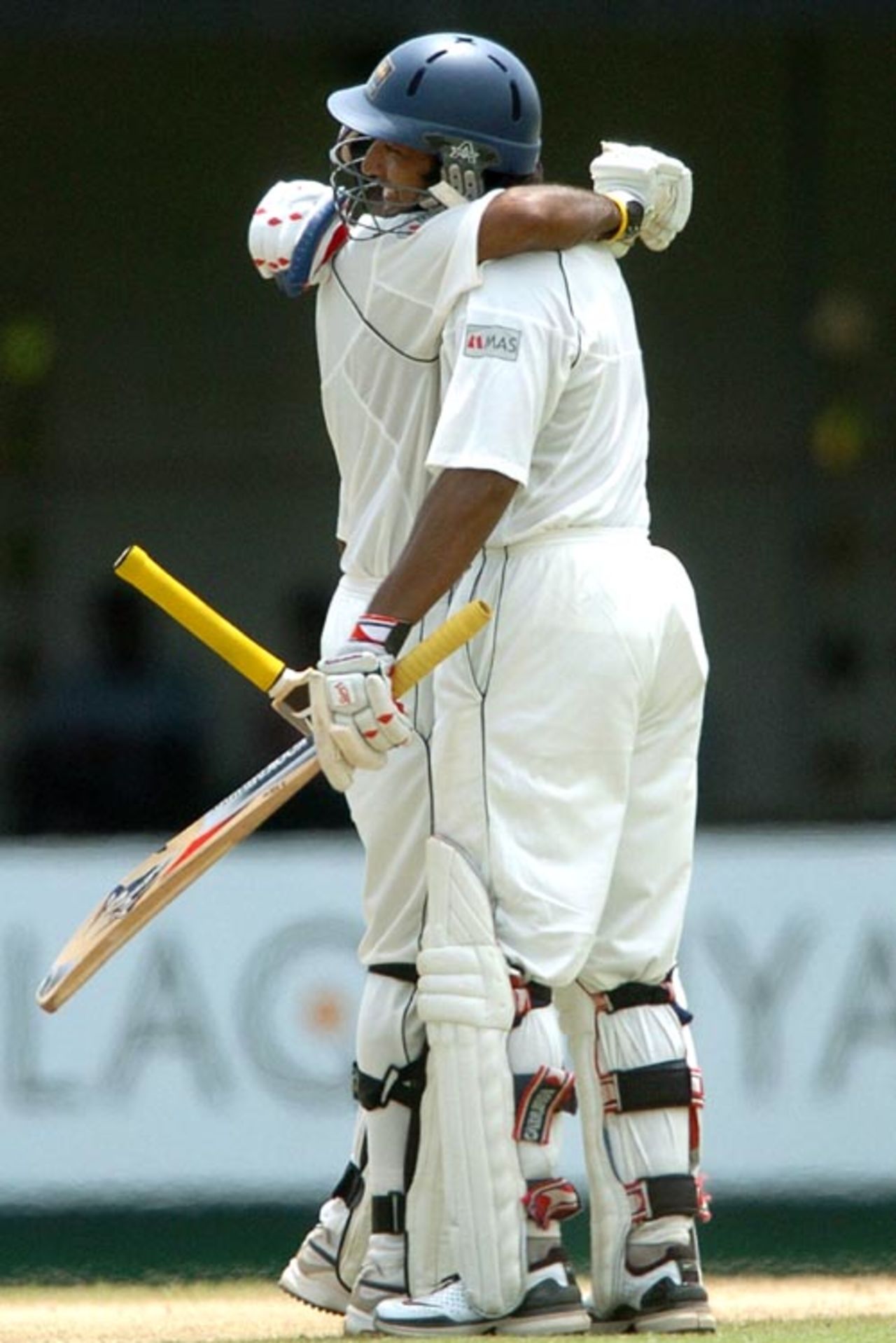 Kumar Sangakkara is congratulated by captain Mahela Jayawardene after reaching his hundred, Sri Lanka v Bangladesh, 2nd Test, P Saravanamuttu Stadium, Colombo, 2nd day, July 4, 2007