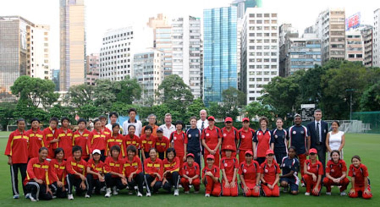 The Hong Kong and China Women's Cricket Teams pose for a photograph after their match at Kowloon Cricket Club on 4th July 2007