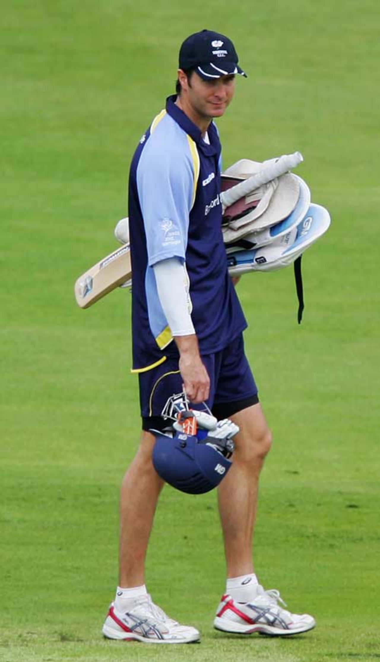 Michael Vaughan heads for the nets as a wet outfield delays the start of the Roses clash, Lancashire v Yorkshire, County Championship, Old Trafford, July 8, 2007