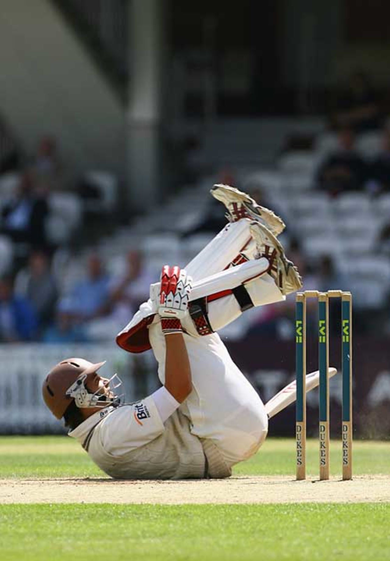 Jade Dernbach falls flat on his back after avoiding a bouncer, Surrey v Durham, County Championship, The Oval, July 9, 2007