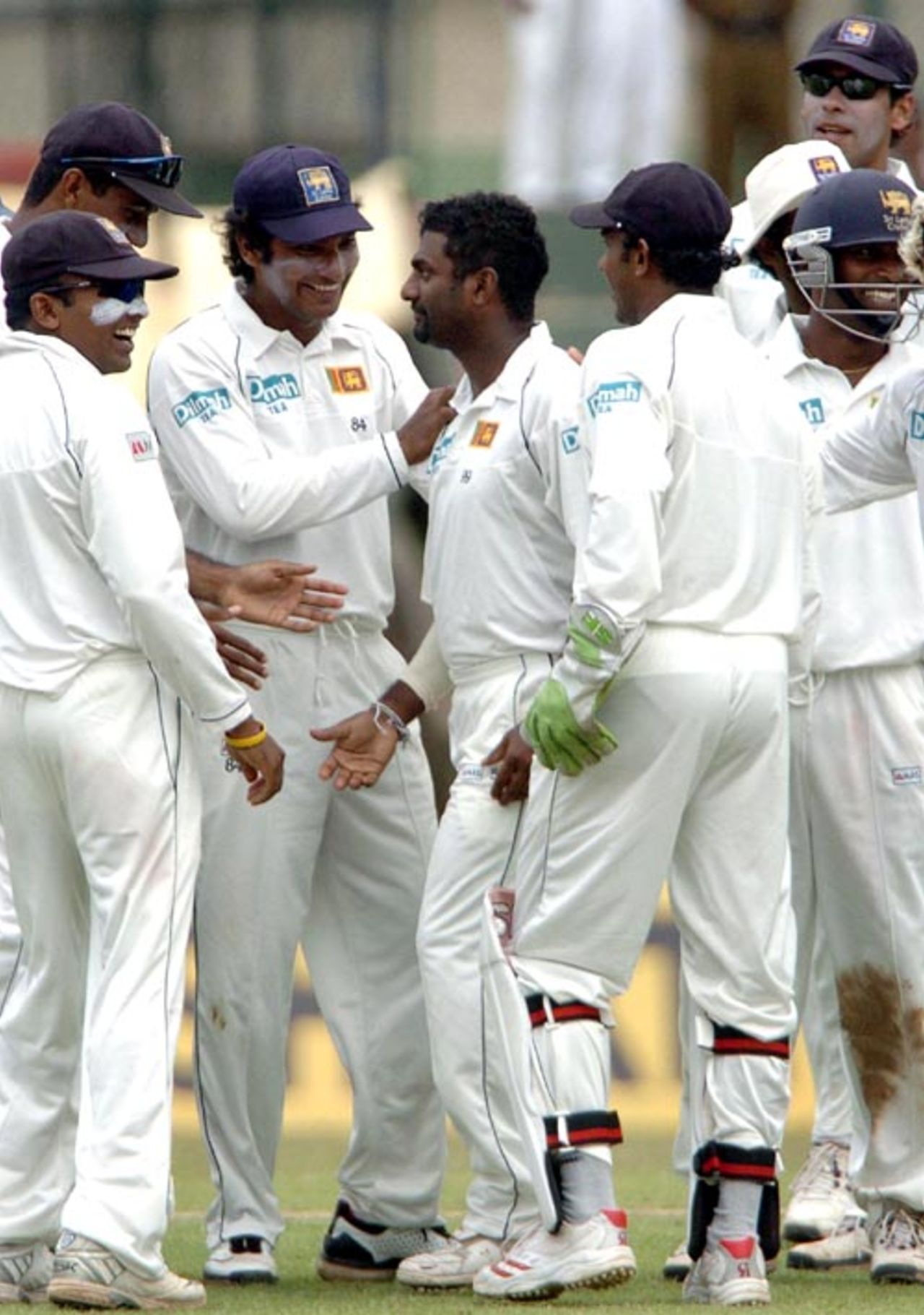 Muttiah Muralitharan celebrates with his team-mates after dismissing Mashrafe Mortaza, Sri Lanka v Bangladesh, 3rd Test, Asgiriya International Stadium, Kandy, 2nd day, July 12, 2007