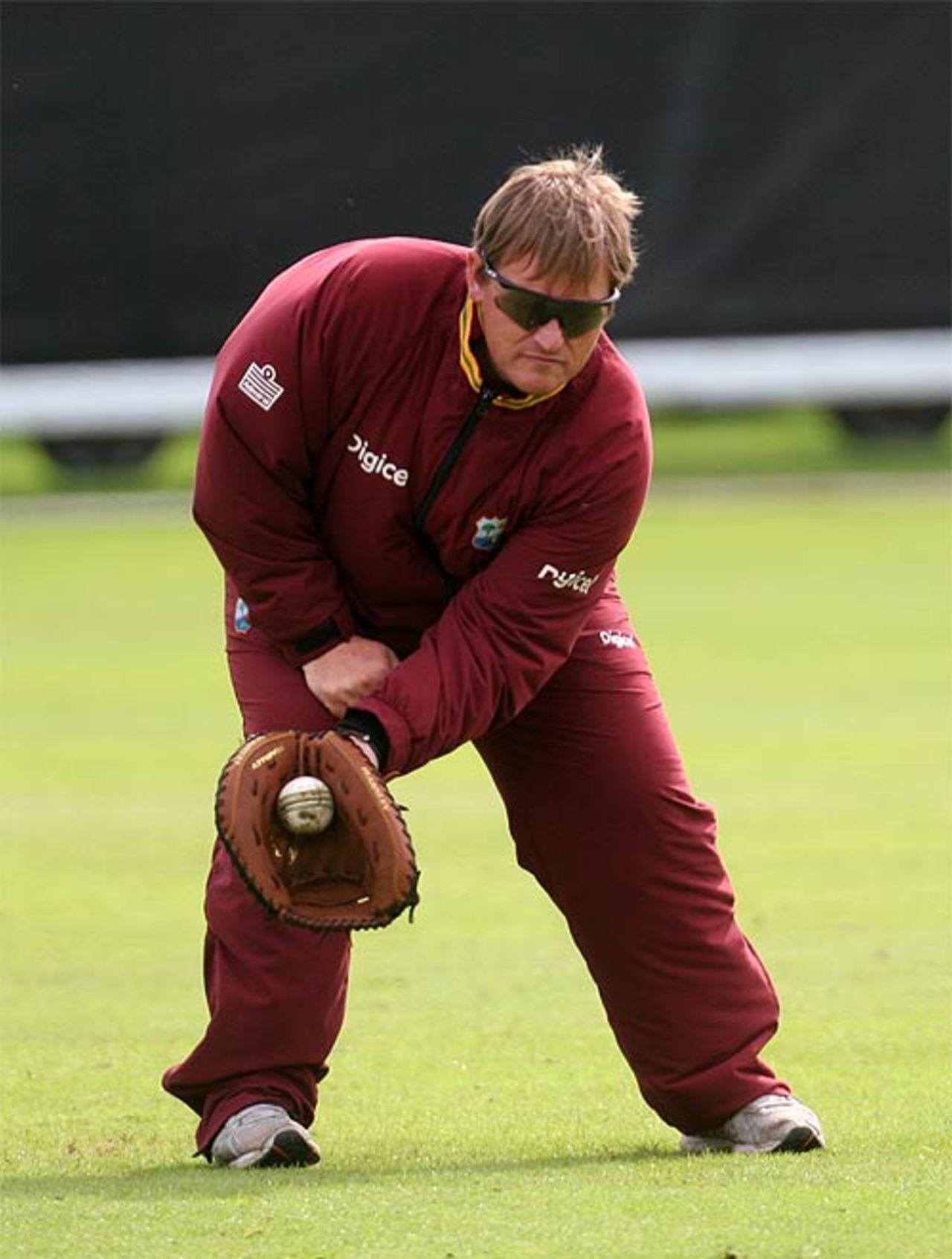 David Moore indulges in fielding practice before the start of West Indies's quadrangular series match against Scotland, Clontarf, July 12, 2007