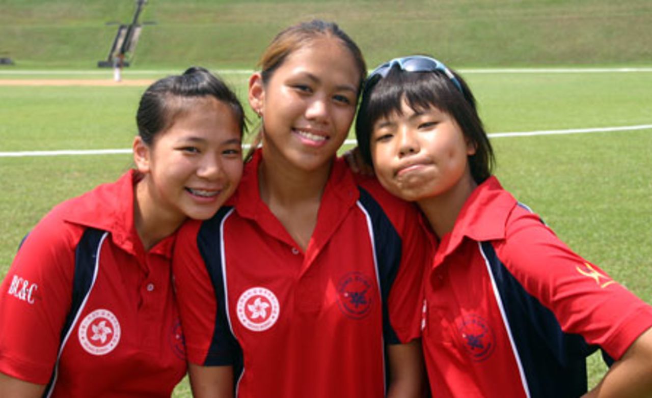 Godiva Li, Kristine Wong and Chan Sau Har pose for a picture before the match against Thailand. ACC Women's Cricket Tournament, 13th July 2007