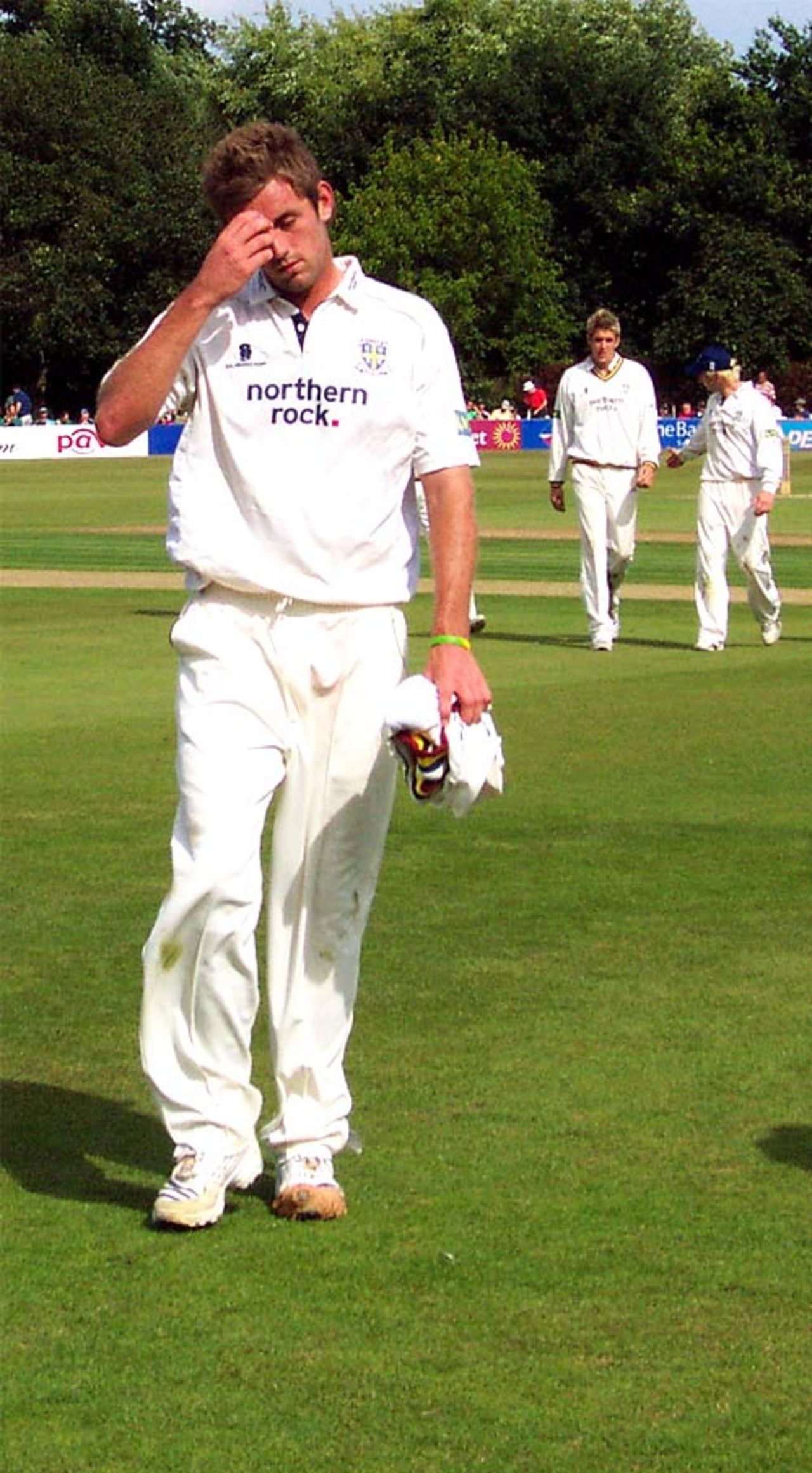 A tired Liam Plunkett walks off after capturing four wickets, Sussex v Durham, Horsham, July 14, 2007