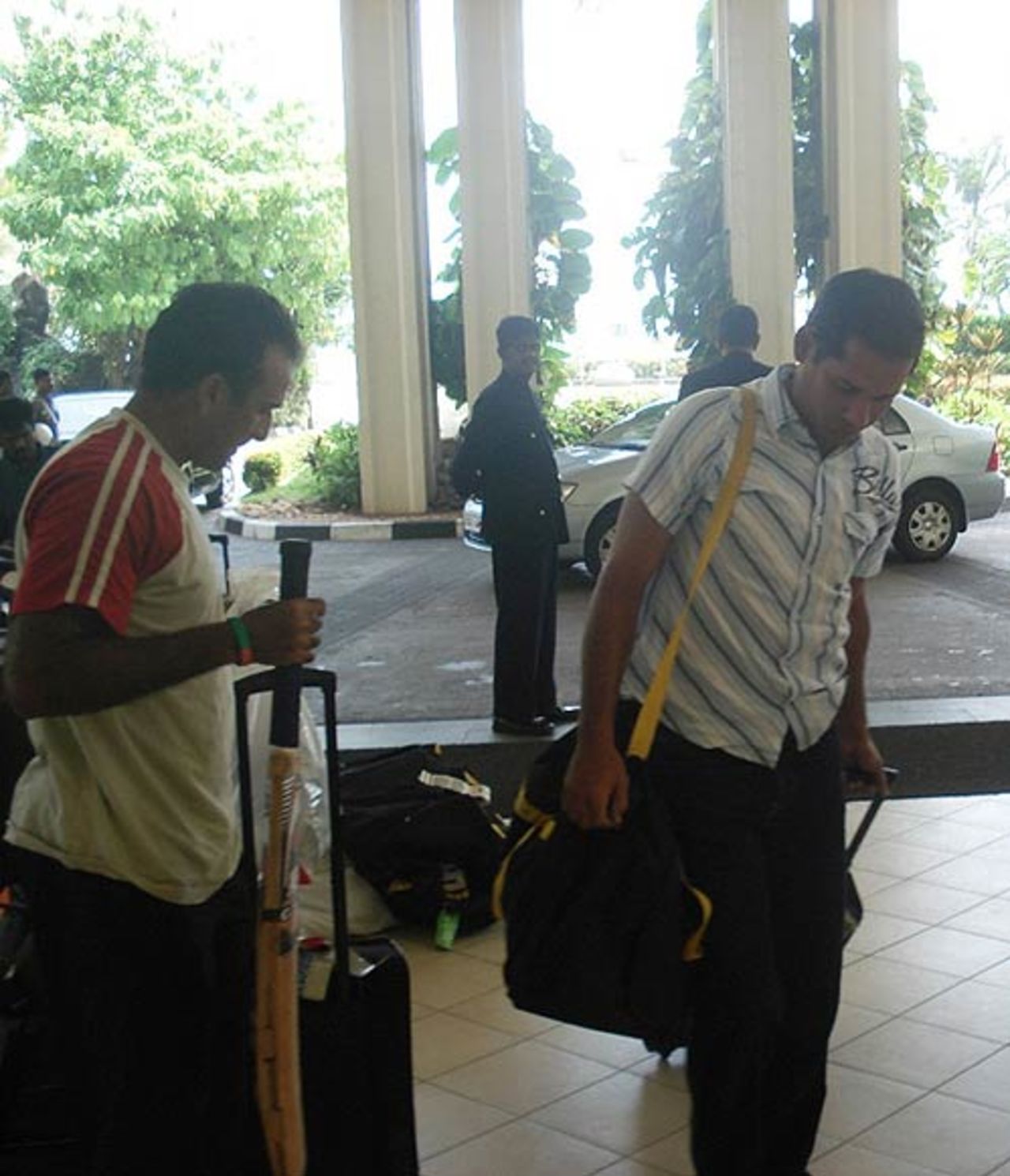 Javed Omar and Habibul Bashar arrive at the team hotel in Colombo, July 15, 2007